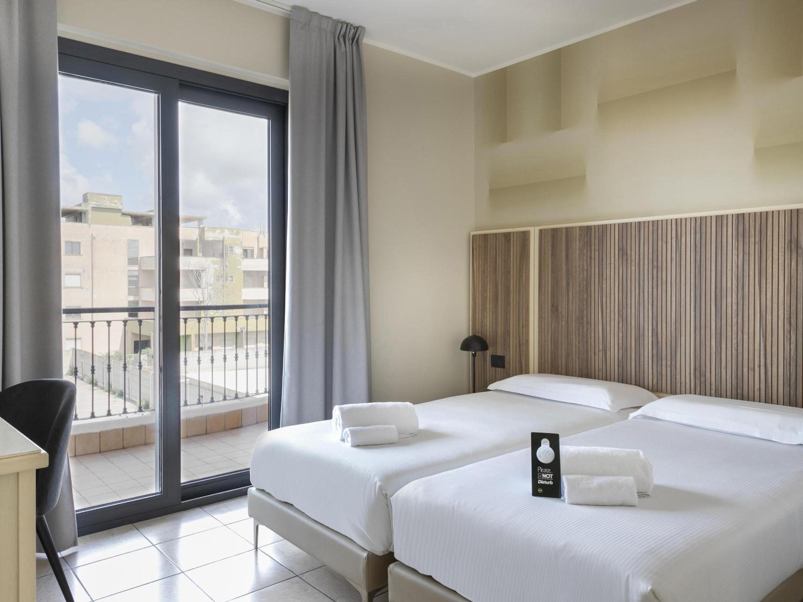 Twin Room - Photo 1
