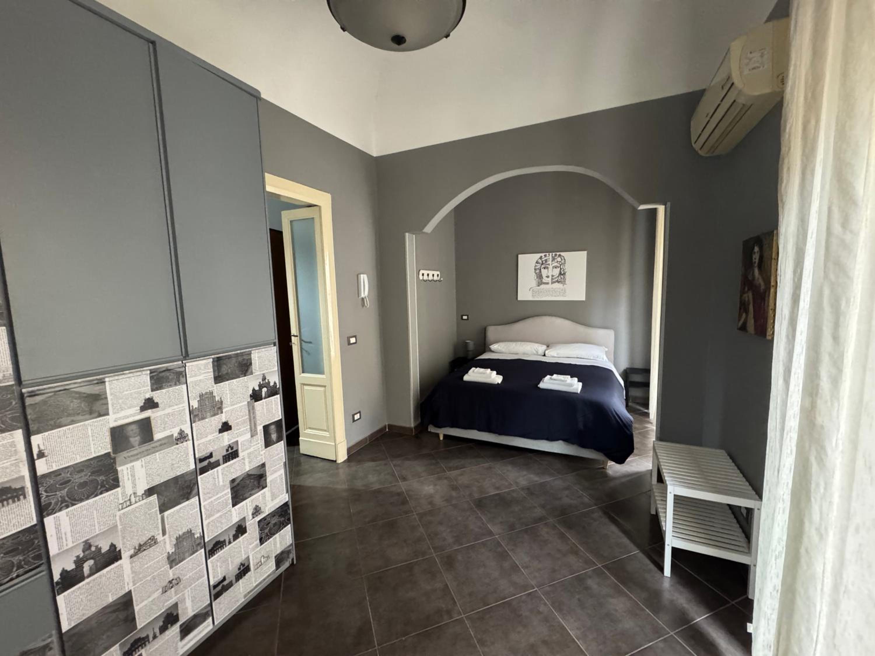 One-Bedroom Apartment with Balcony and City View