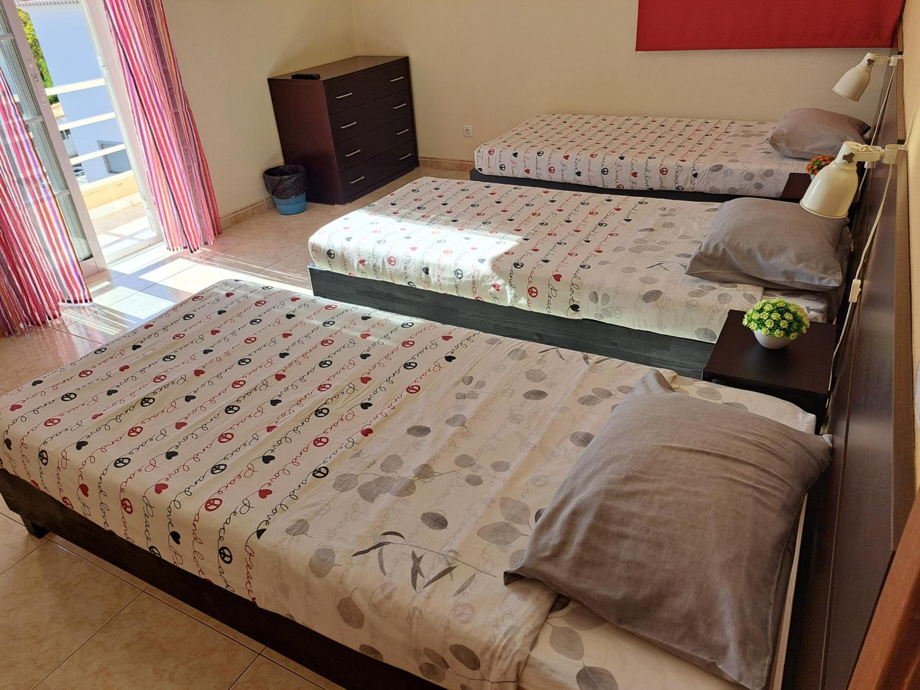 Basic Triple Room with Shared Bathroom photo 2