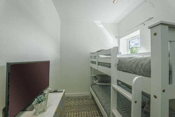 Three-Bedroom Apartment photo 1