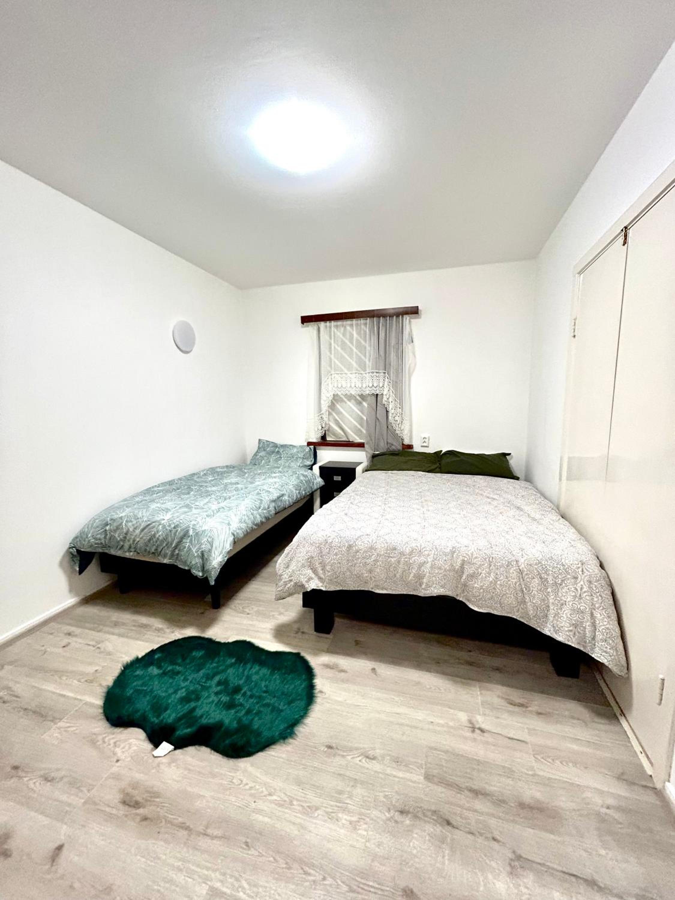 Basic Triple Room With Shared Bathroom photo 1