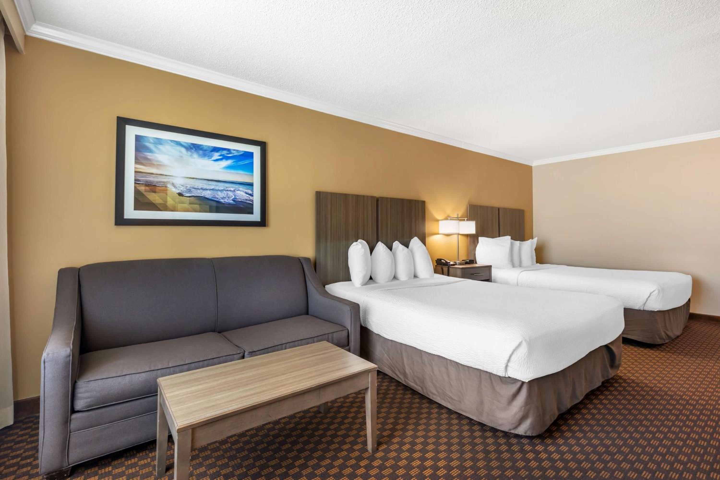 Queen Room with Two Queen Beds and Bathtub - Disability Access/Sofa Bed - Photo 1