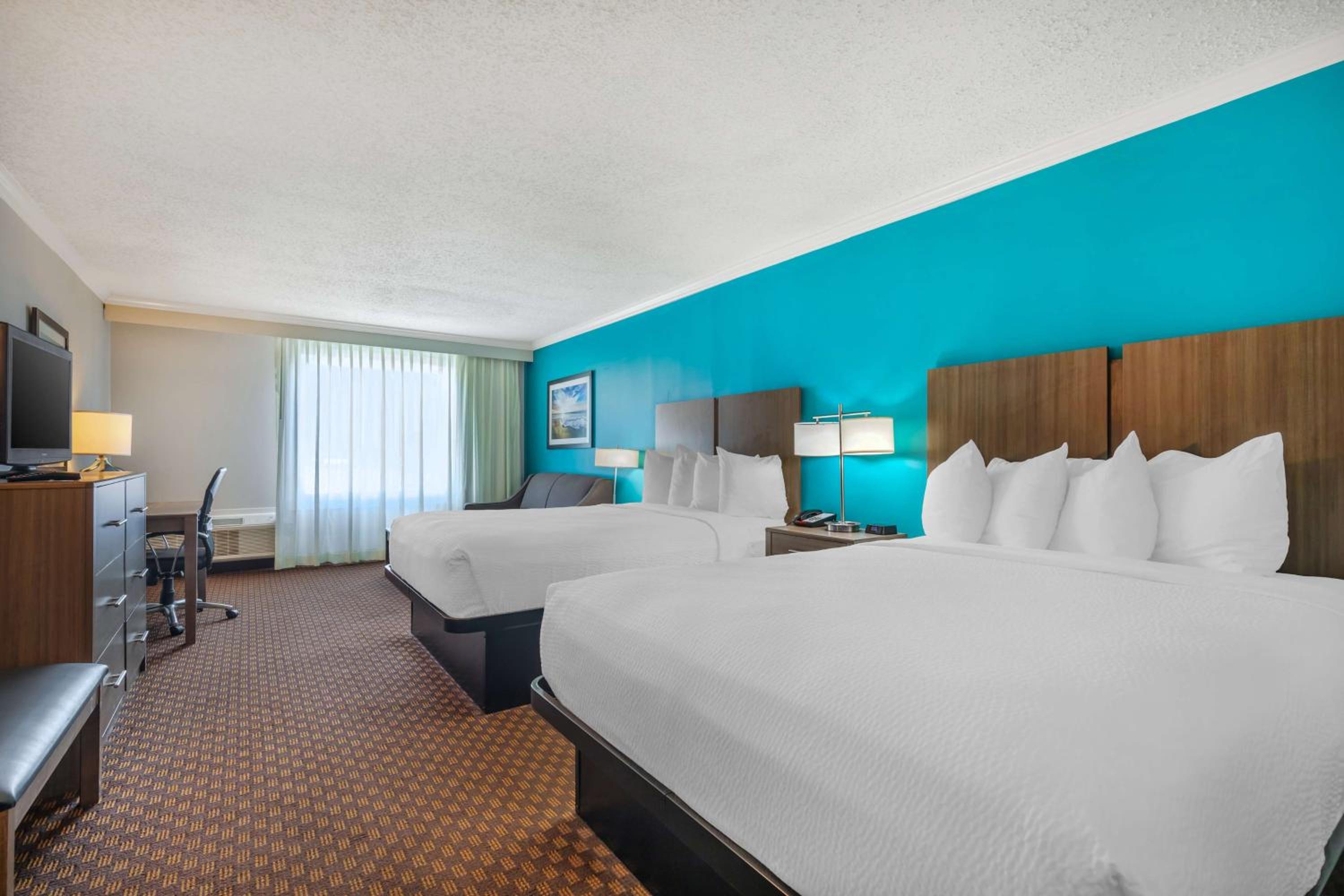 Queen Room with Two Queen Beds - Photo 1