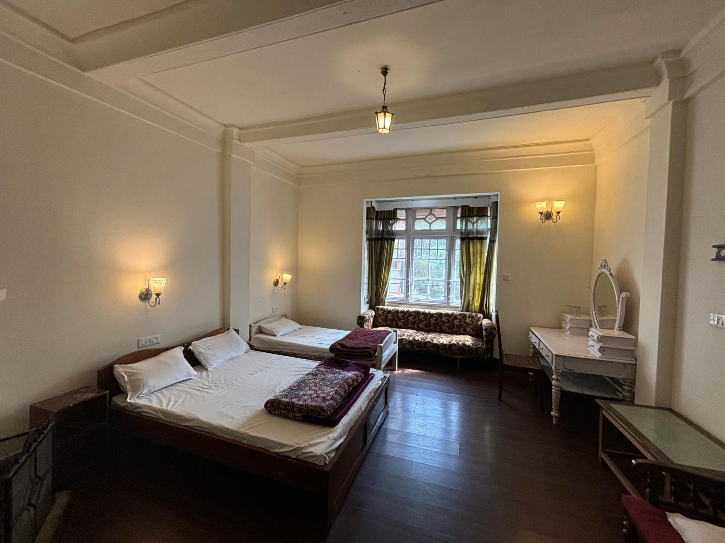 Deluxe Triple Room - Photo 1