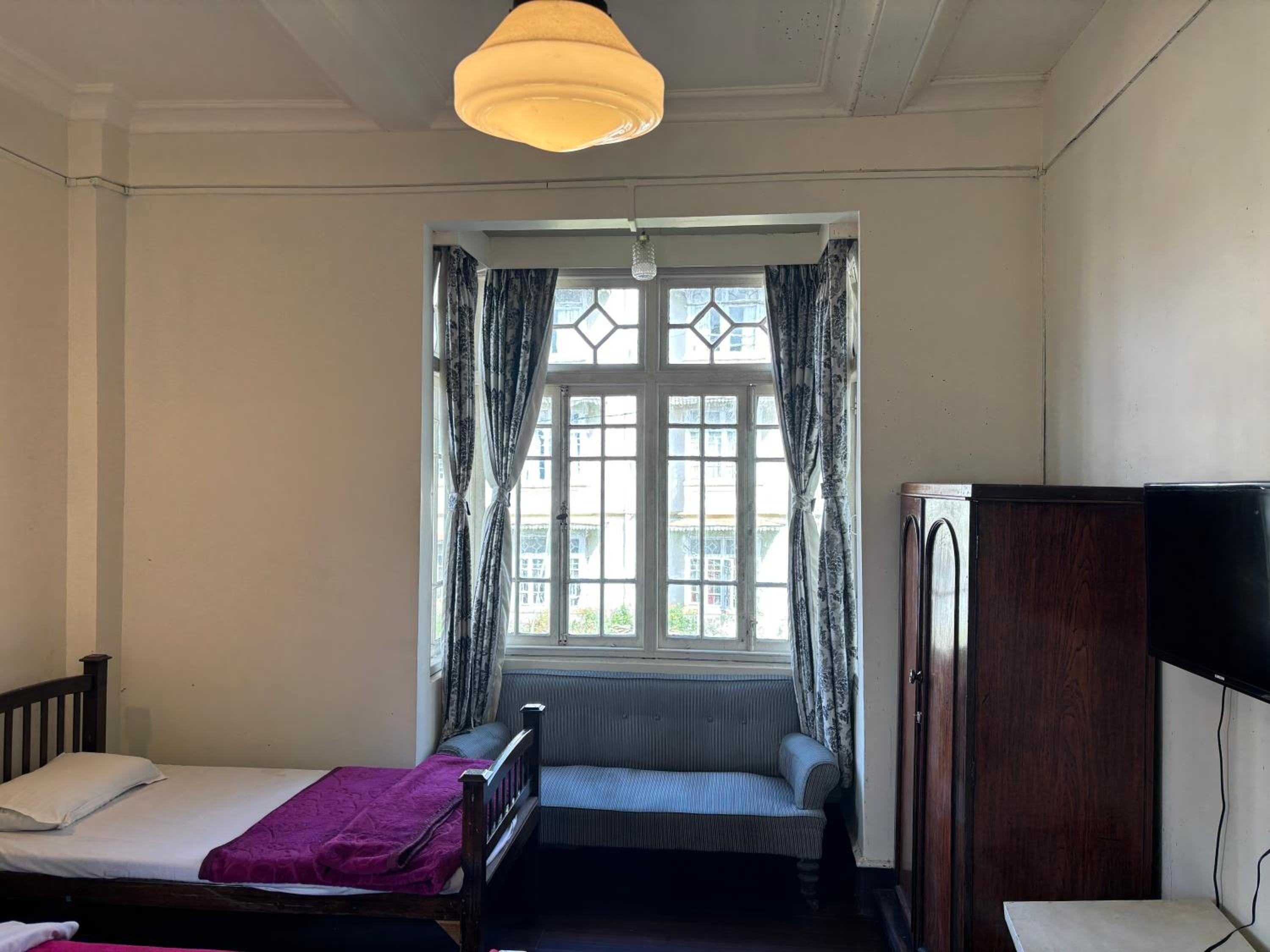 Deluxe Triple Room - Photo 10