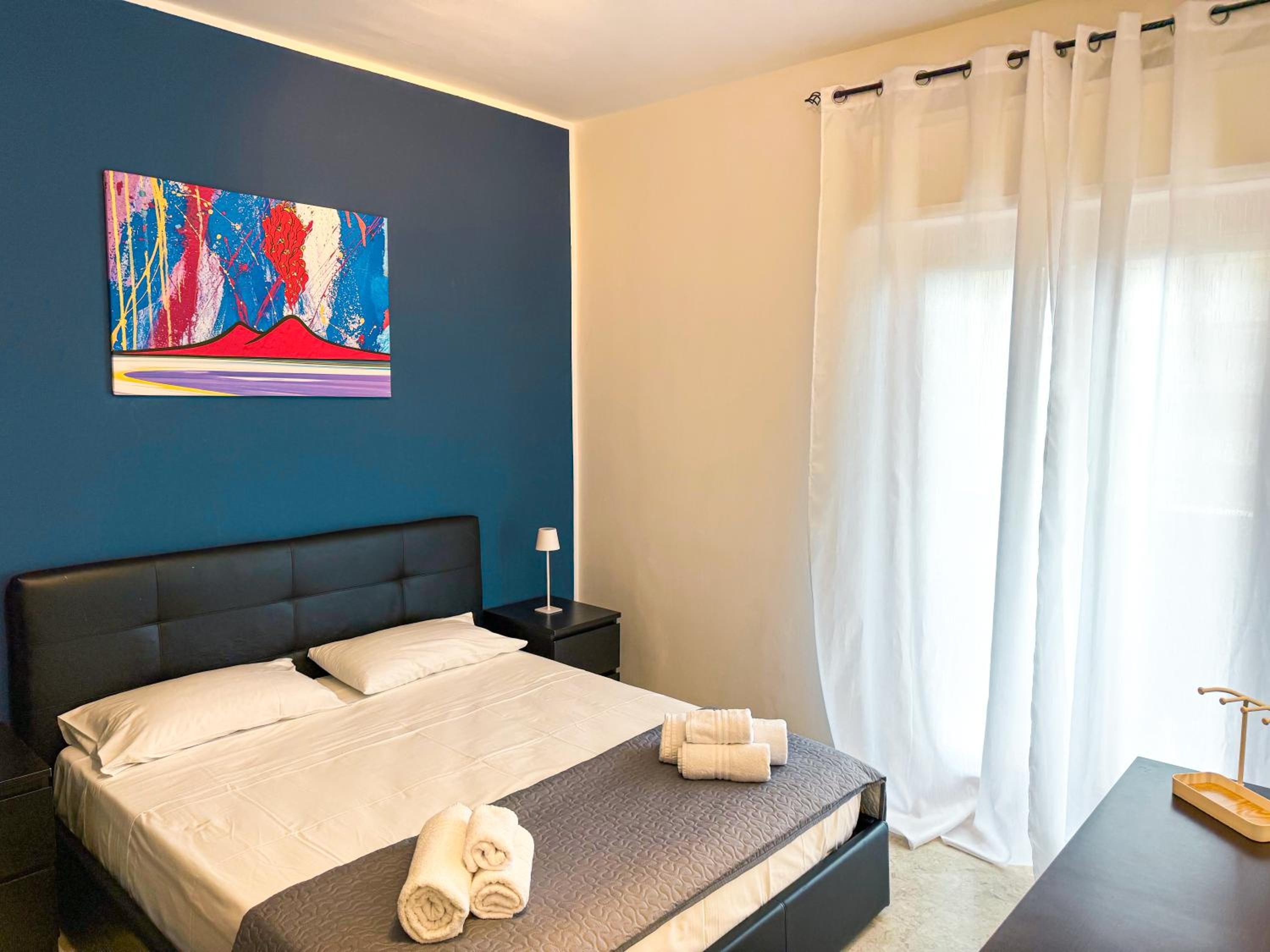 One-Bedroom Apartment with Balcony and City View