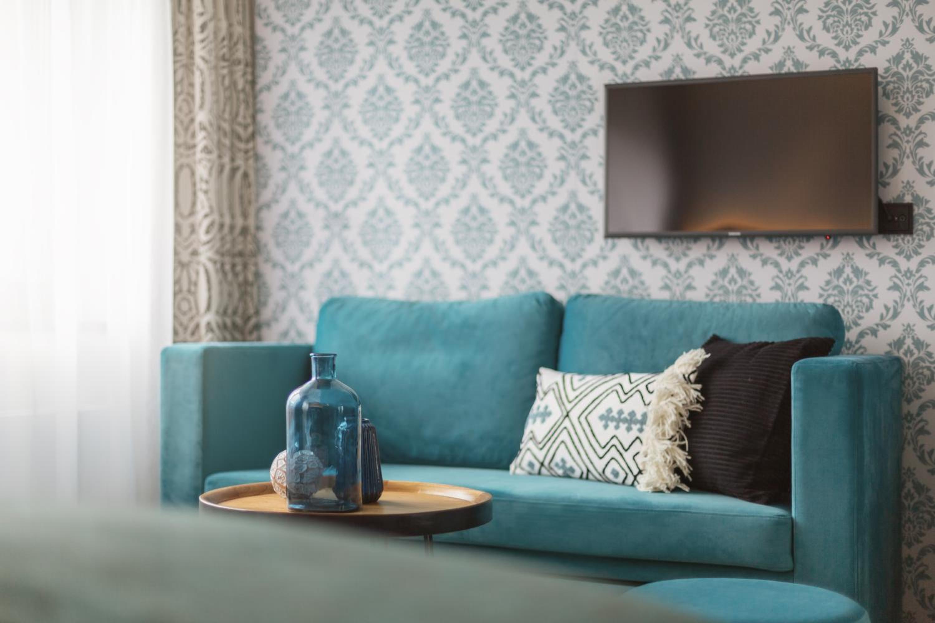 Premium Family Queen Room with Sofa Bed - Photo 1