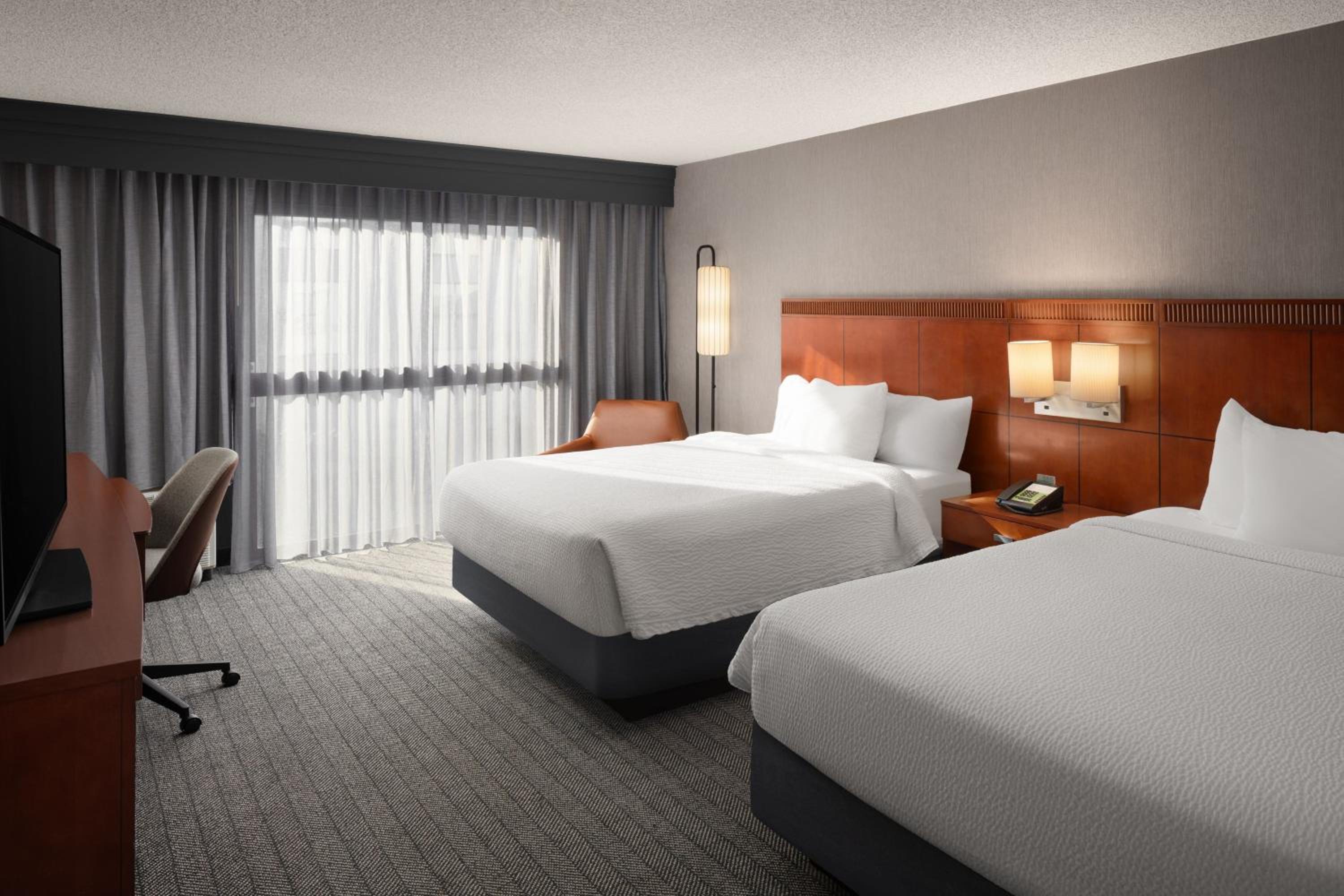 Queen Room with Two Queen Beds - Photo 1