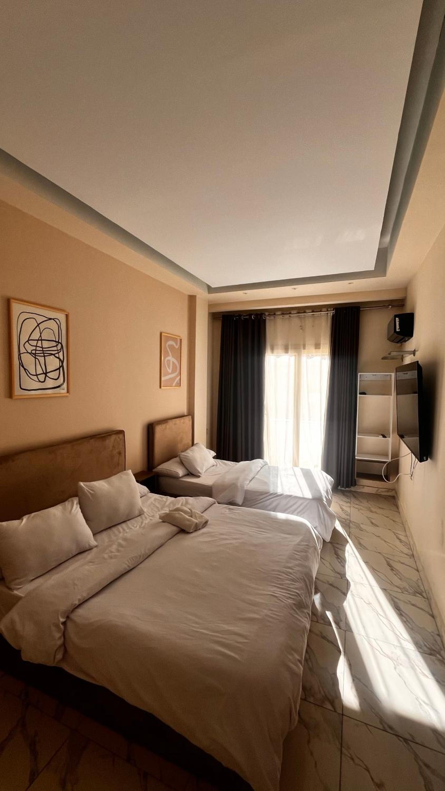 Chambre Triple avec Terrasse