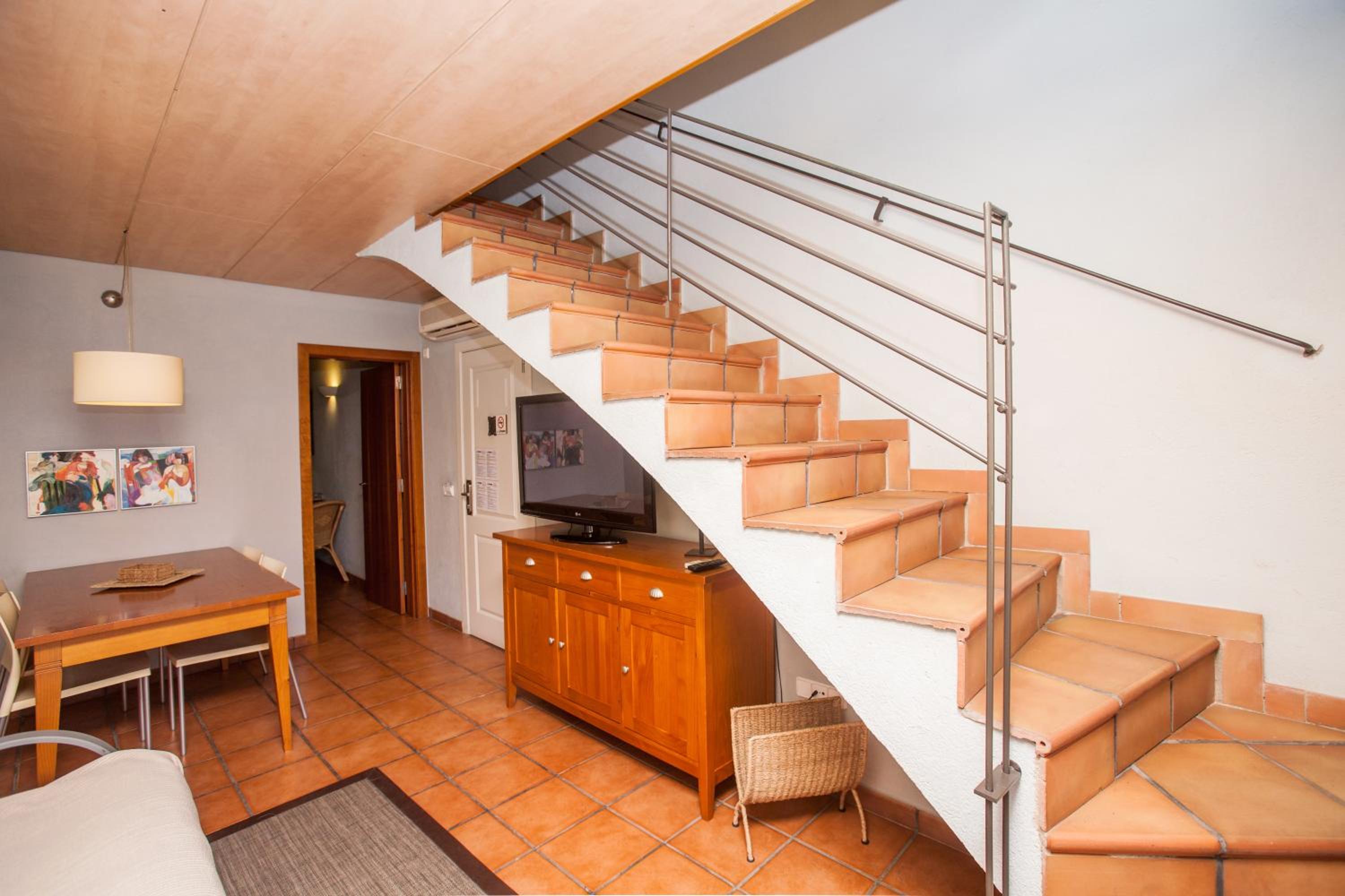 Habitación Doble Deluxe con Dos Camas Dobles