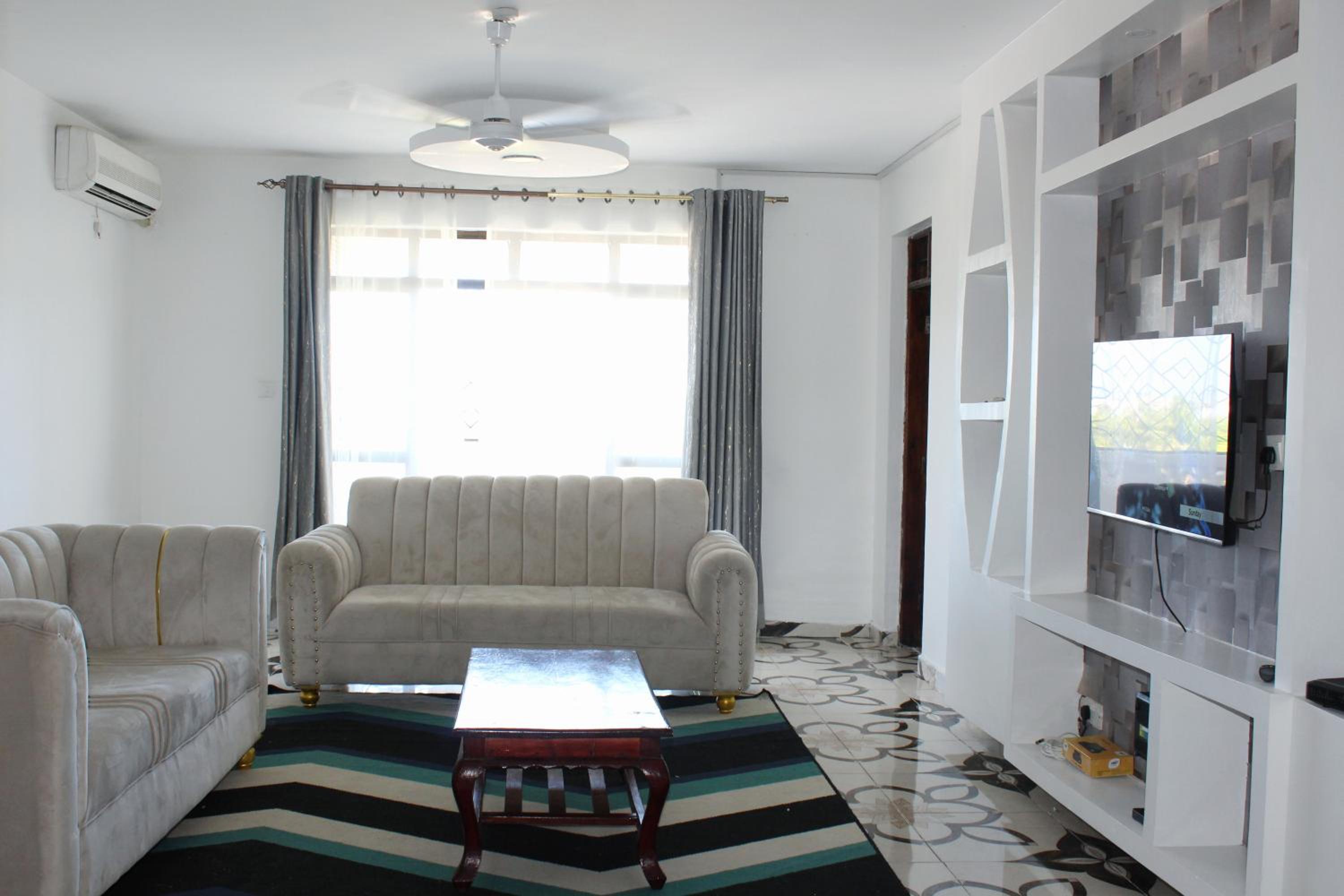Three-Bedroom Apartment photo 1