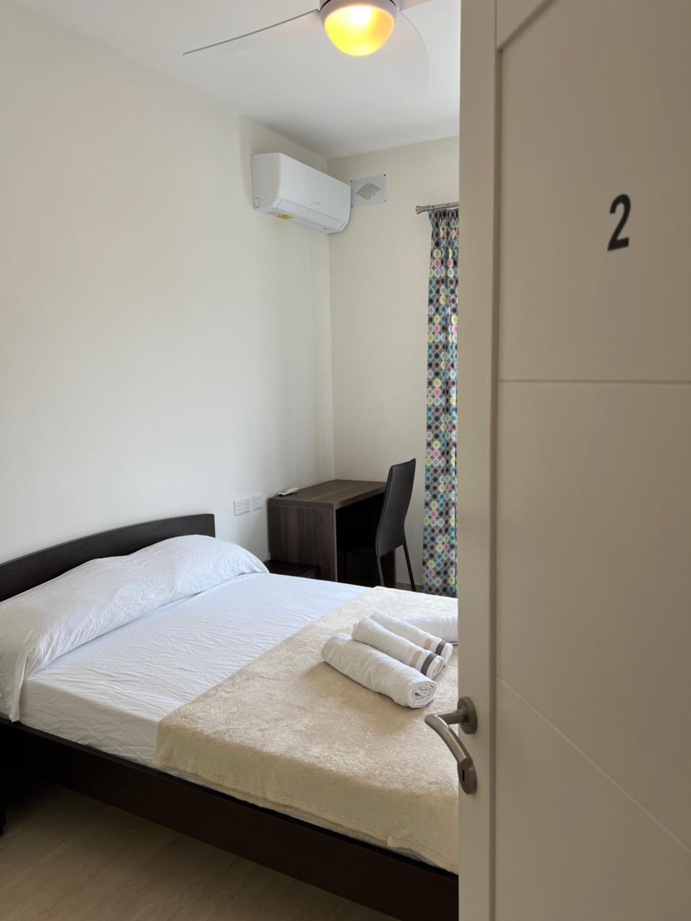 Queen Room With Shared Bathroom