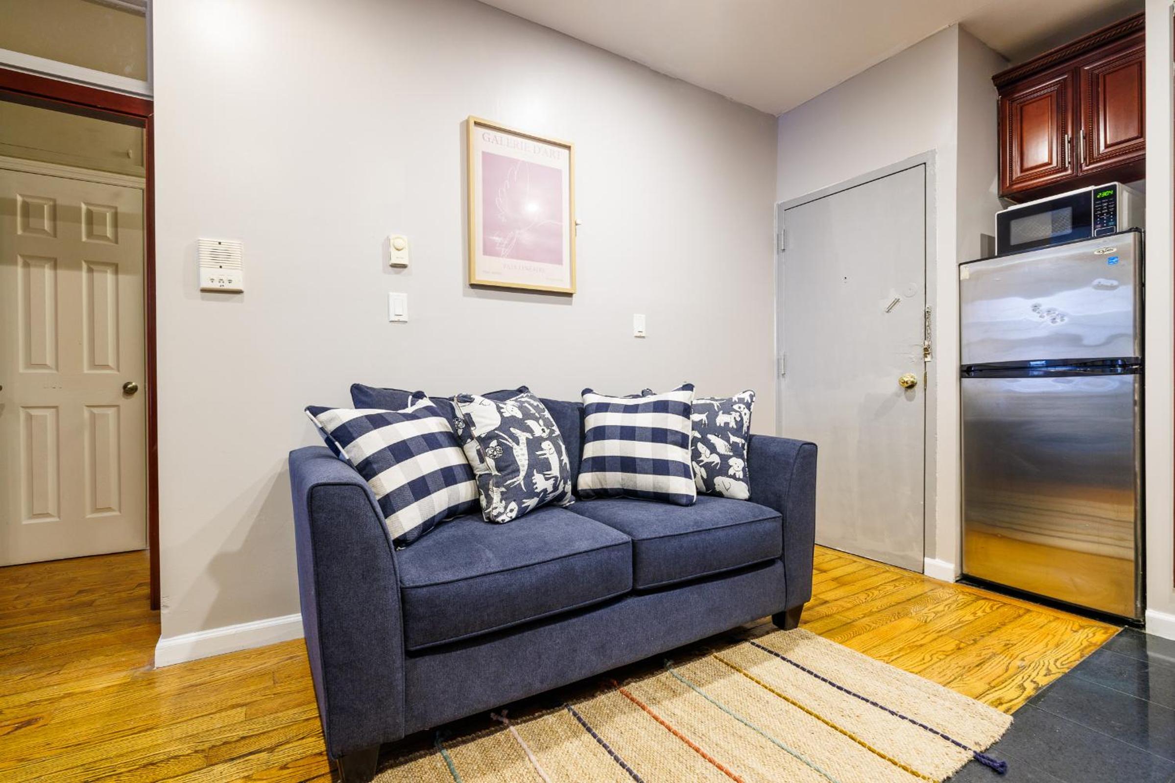 Three-Bedroom Apartment photo 1