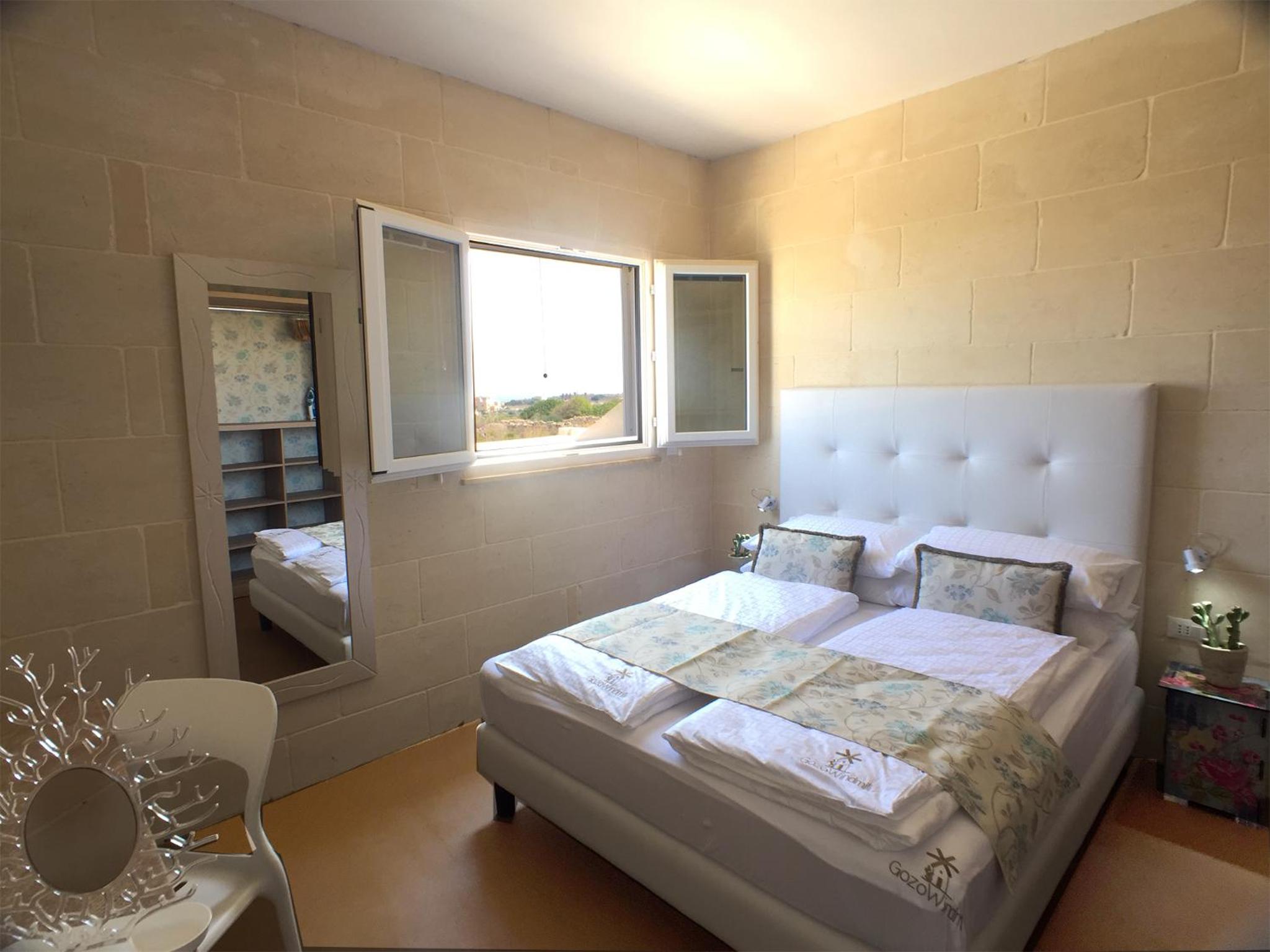 Three-Bedroom Apartment - Photo 32