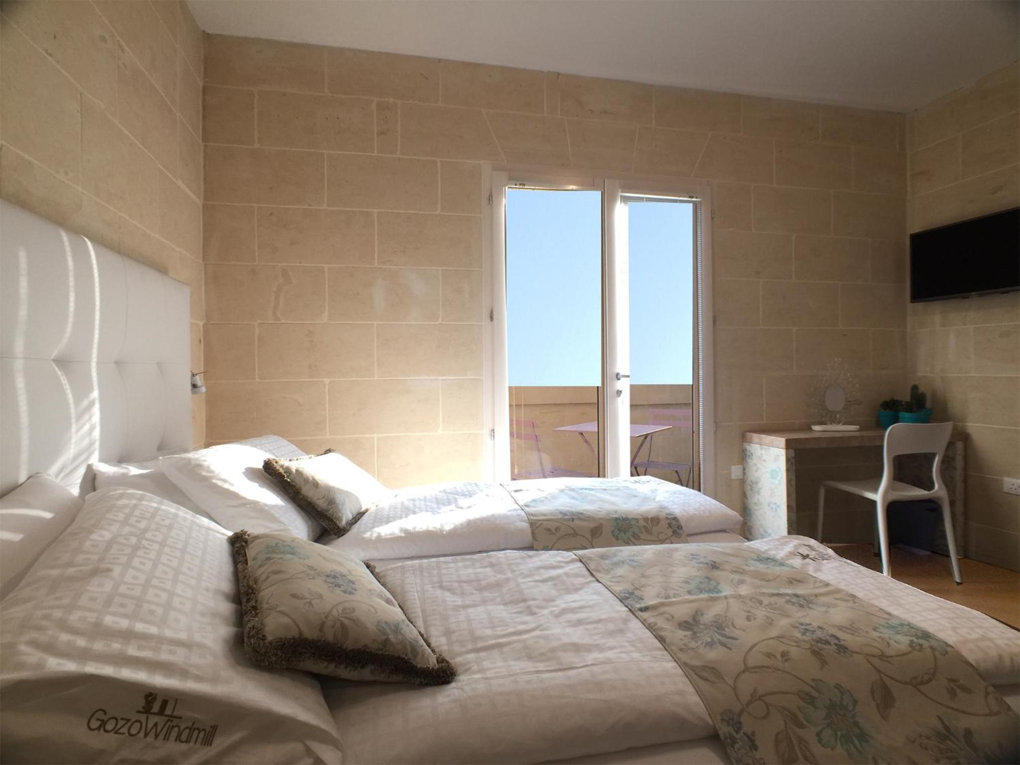Three-Bedroom Apartment - Photo 26