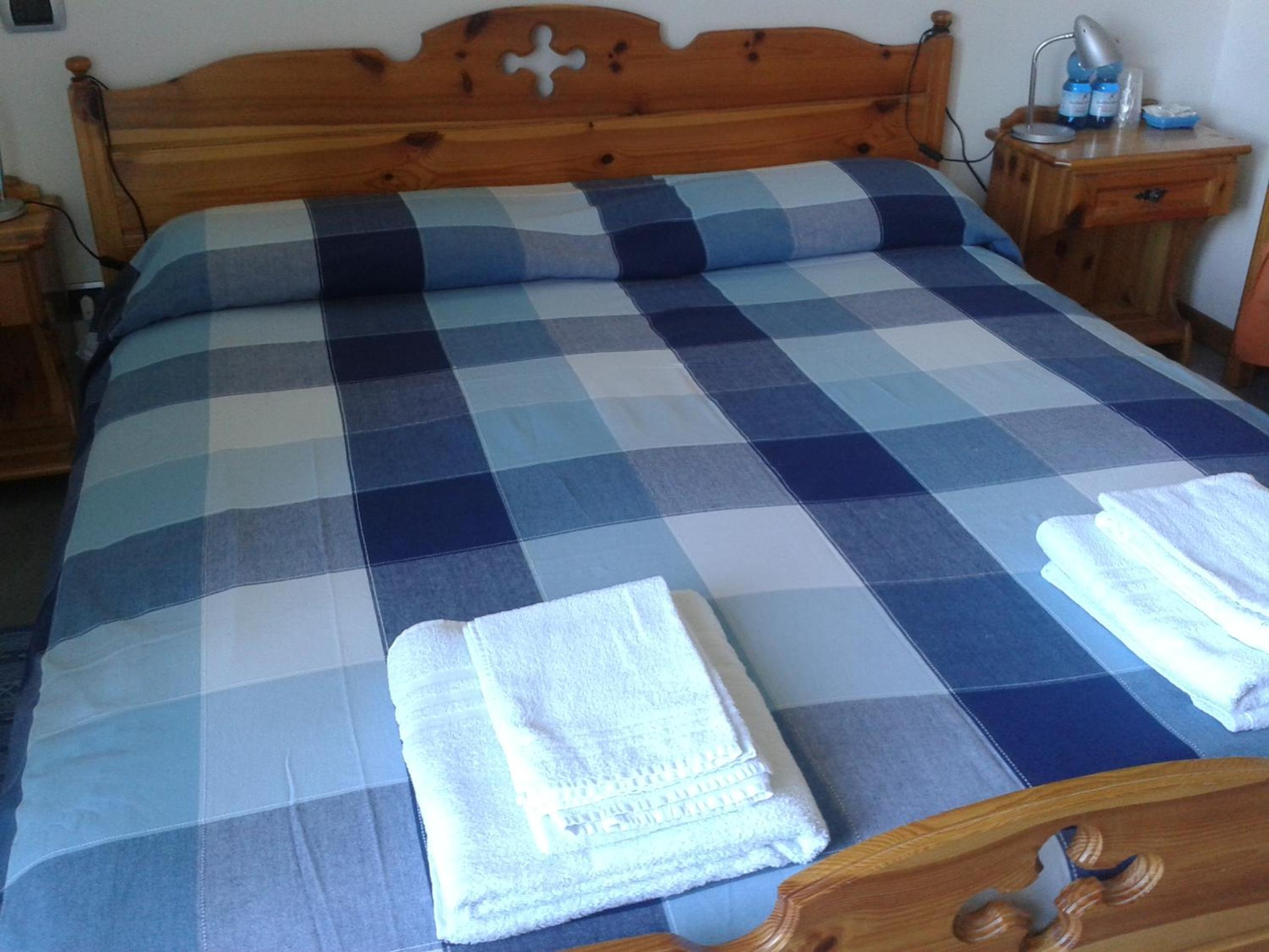 Quadruple Room with Shared Bathroom