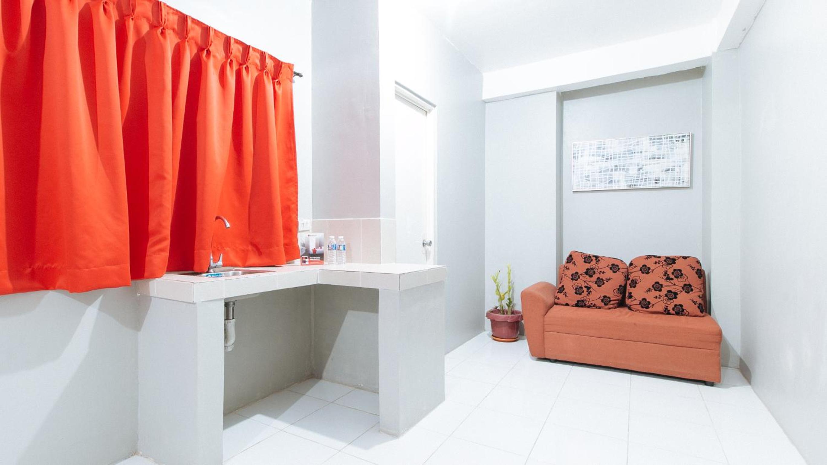 Deluxe Triple Room - Photo 20