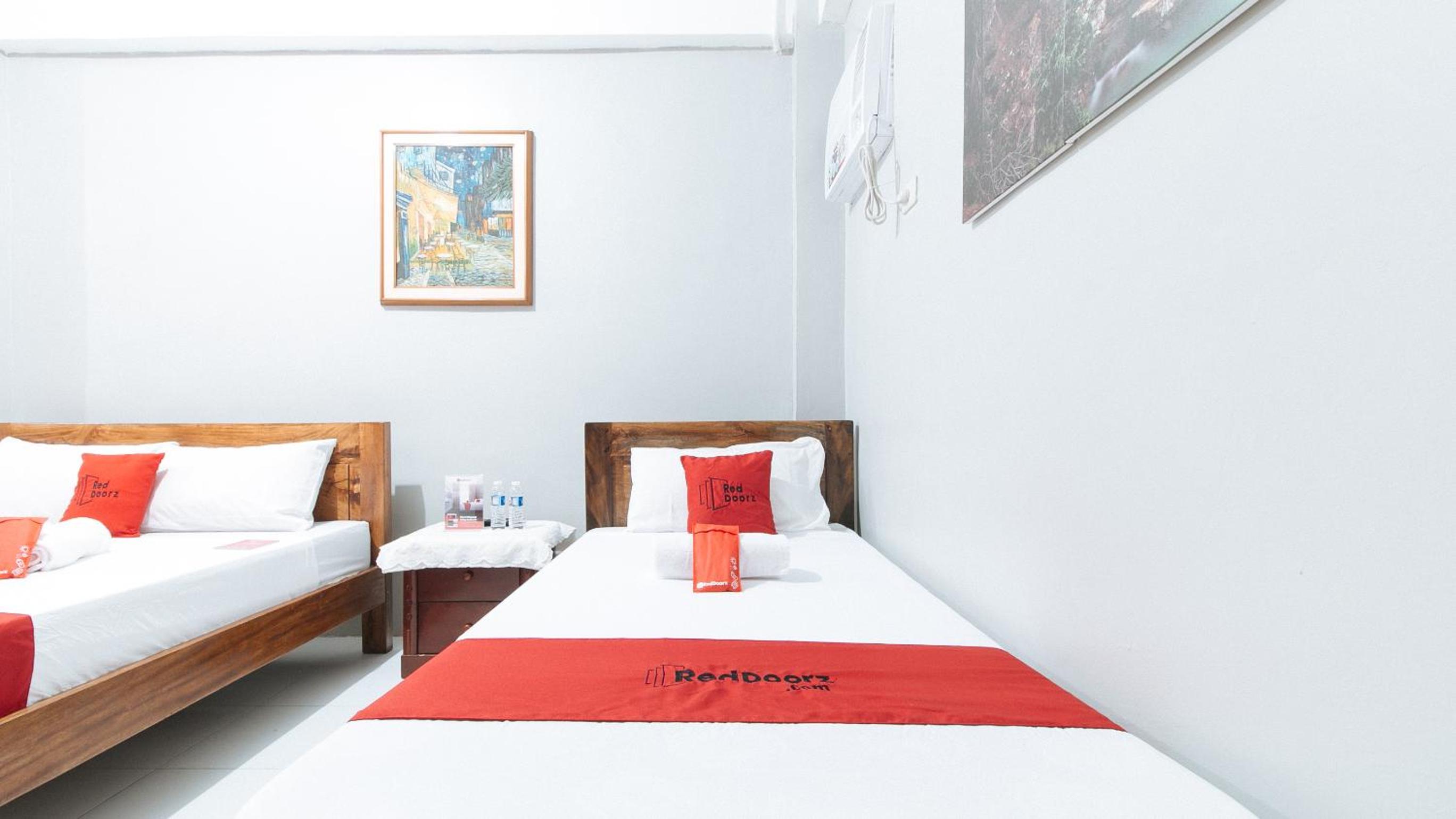 Deluxe Triple Room - Photo 17