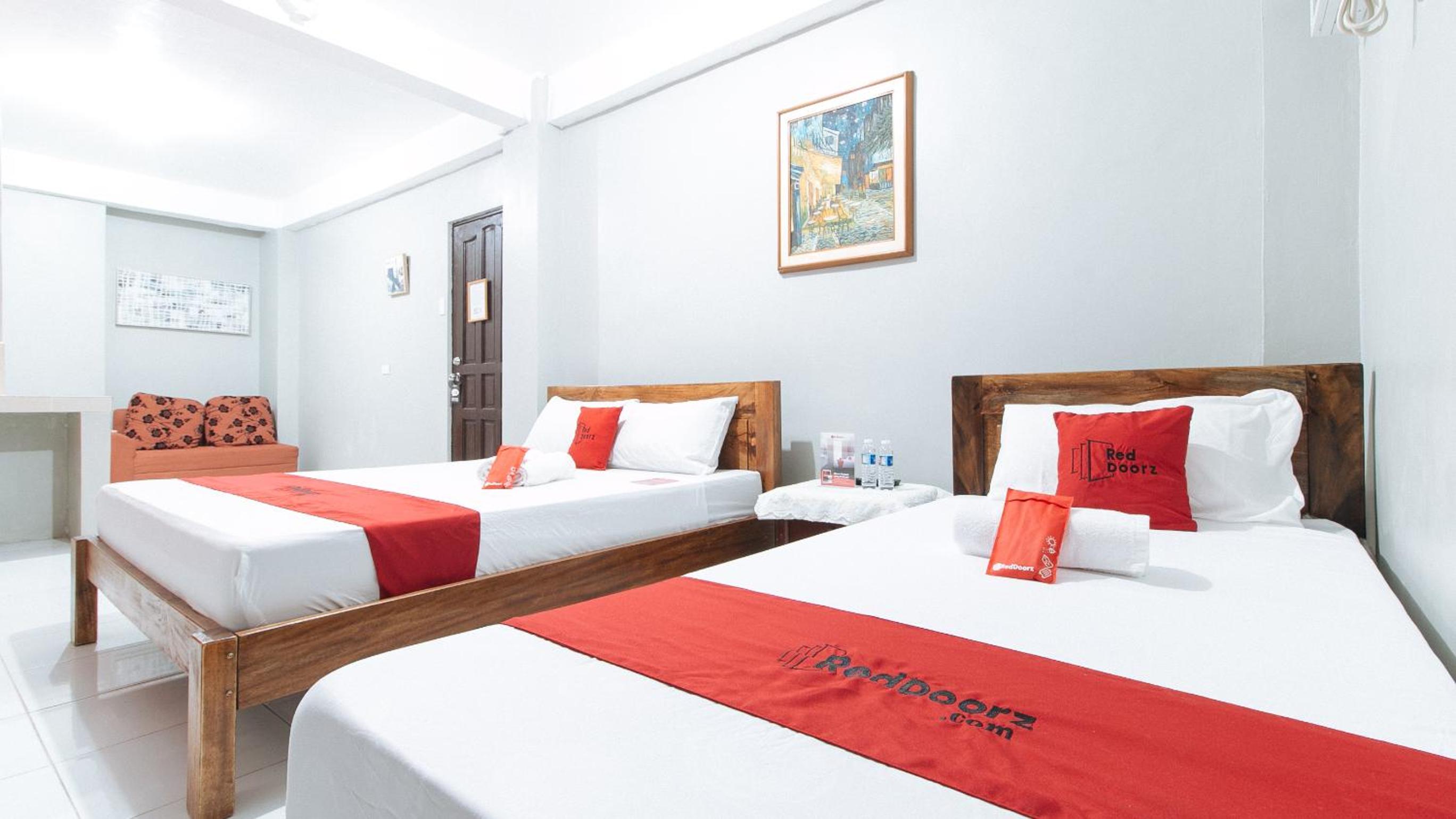 Deluxe Triple Room - Photo 16