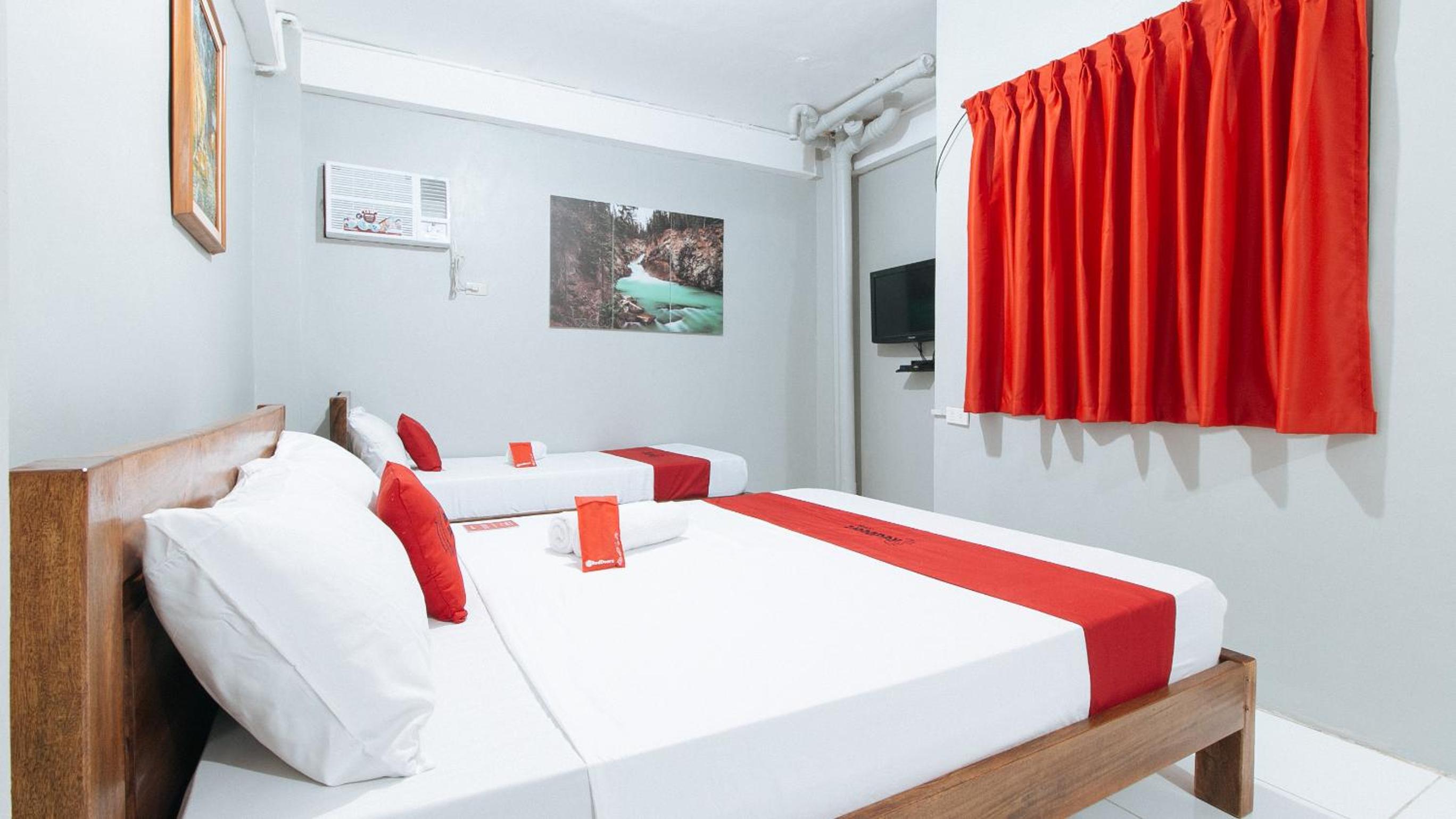 Deluxe Triple Room - Photo 18