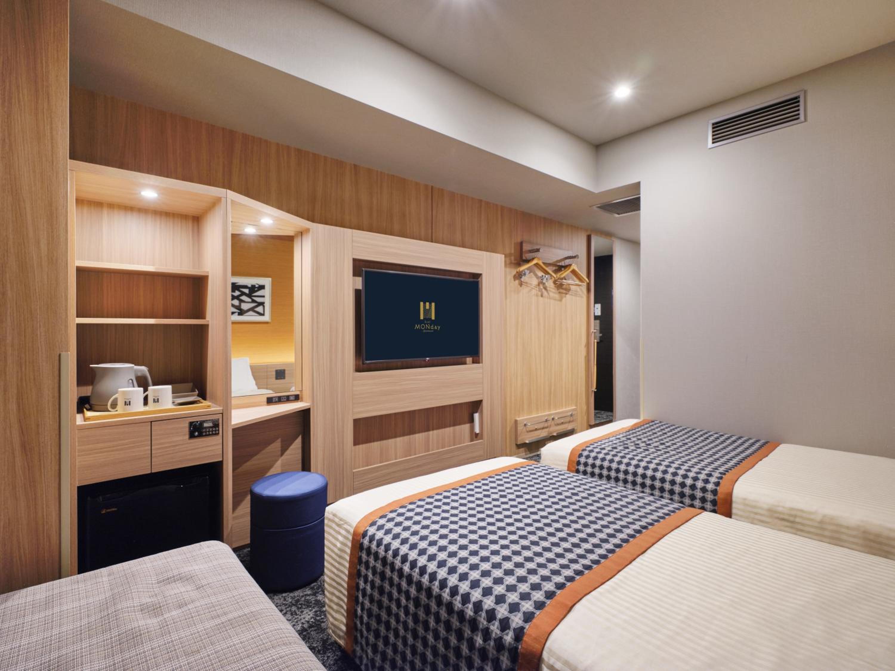 Deluxe Twin Room with Sofa bed photo 3