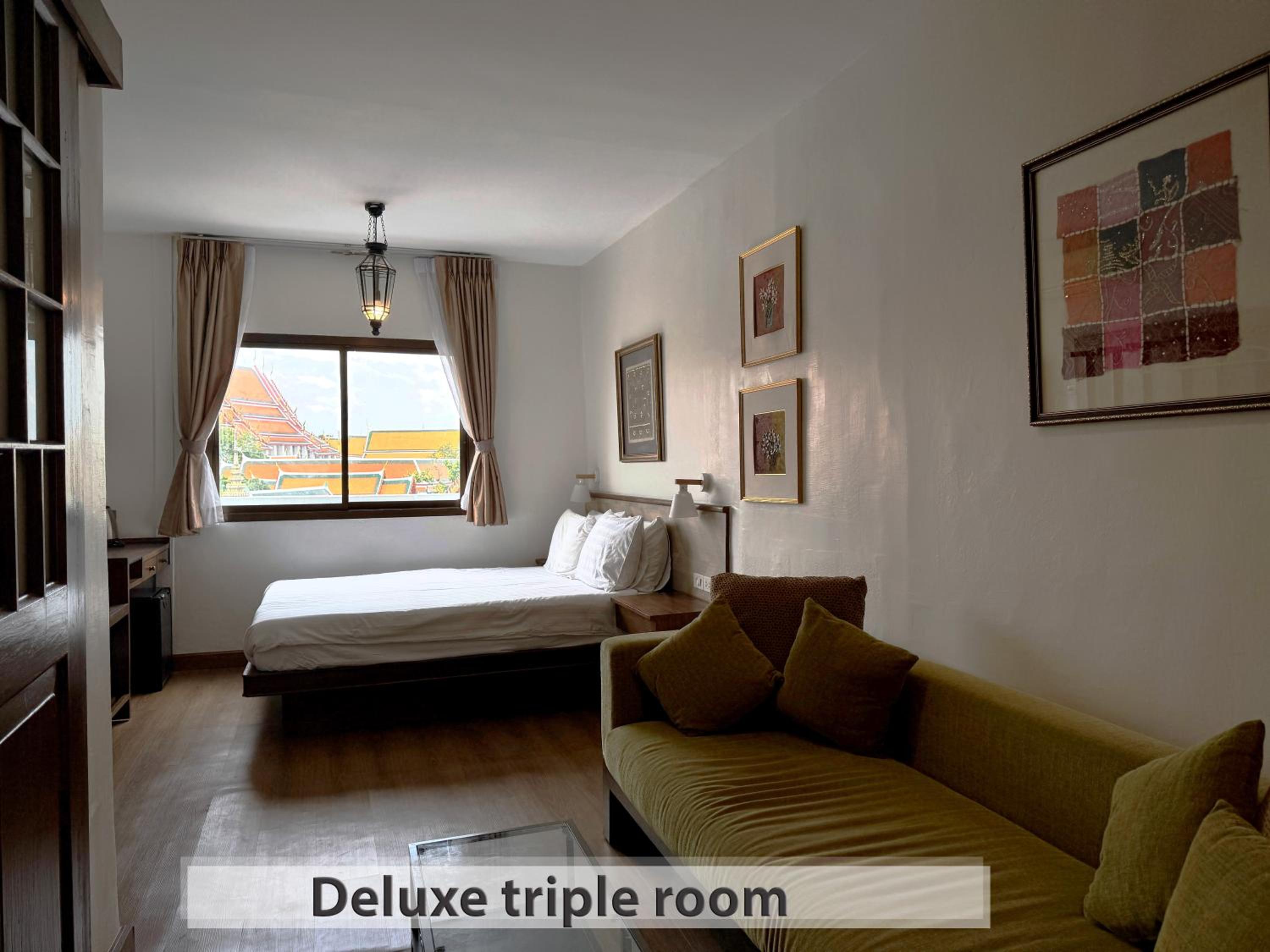 Deluxe Triple Room photo 1
