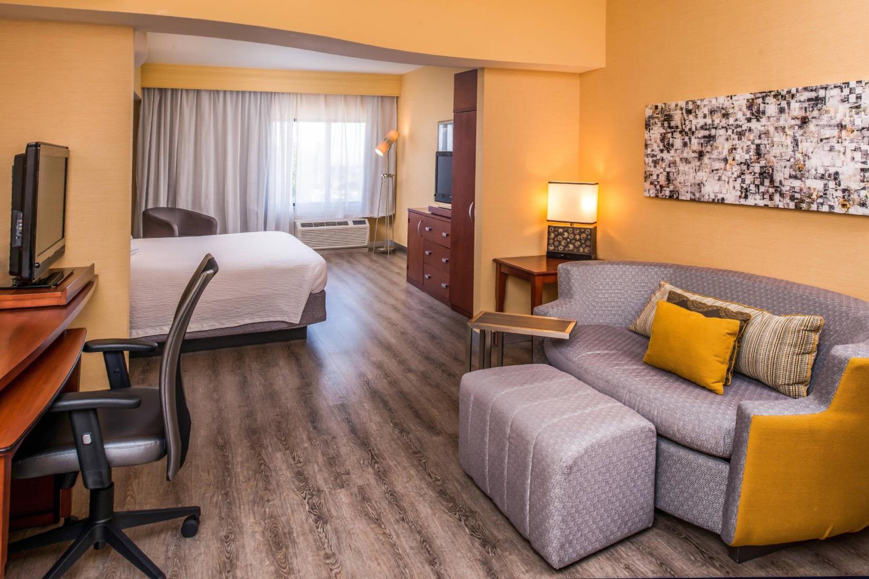 King Room with Sofa Bed and Roll-in Shower - Mobility and Hearing Accessible