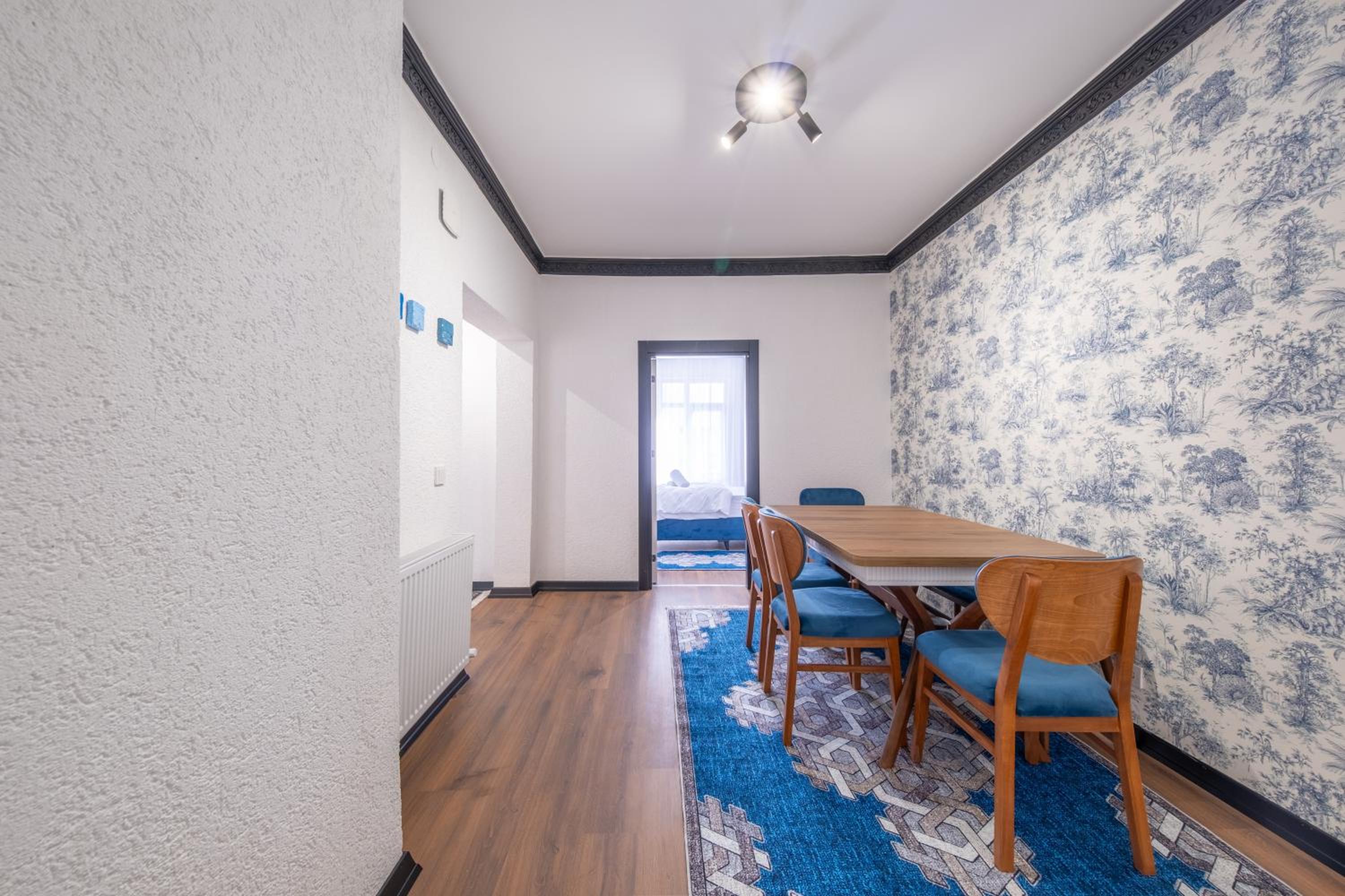 Three-Bedroom Apartment with Balcony photo 2
