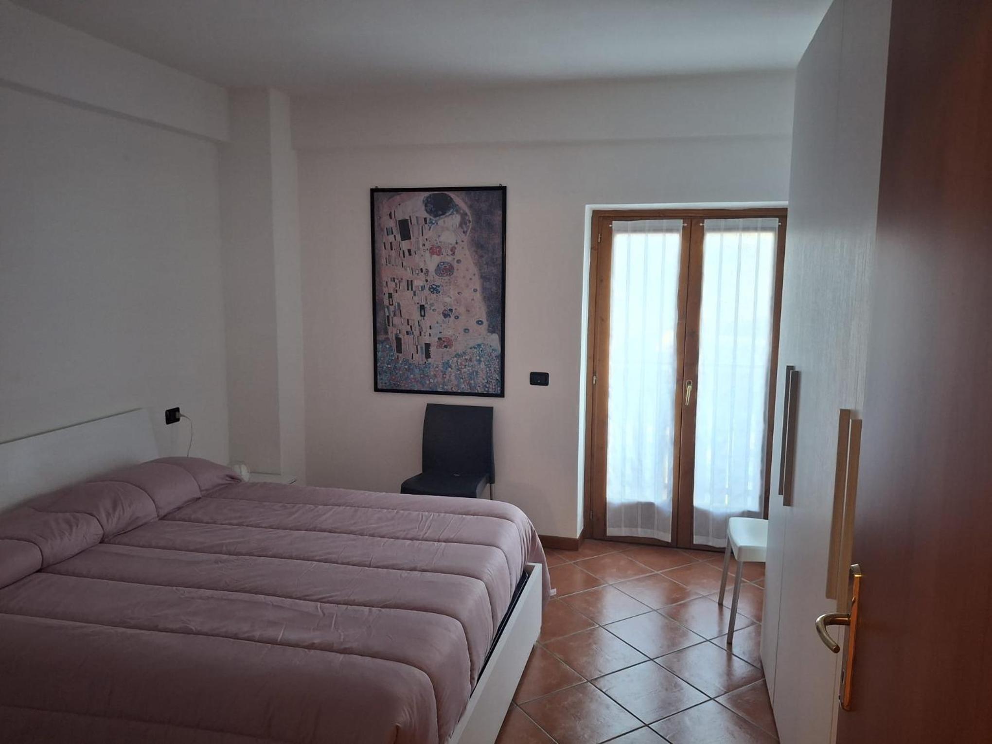 One-Bedroom Apartment with Balcony and Mountain View  