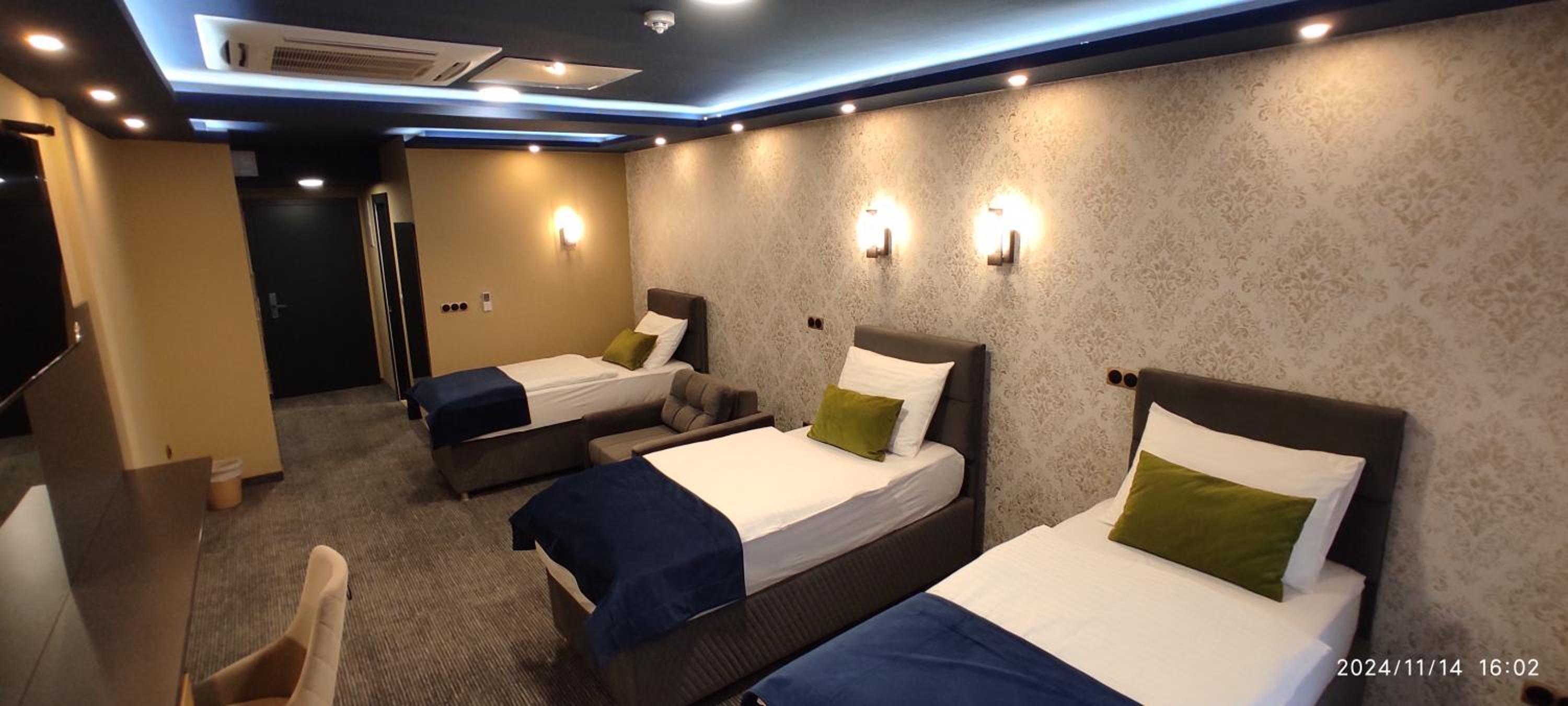 Deluxe Triple Room - Photo 1