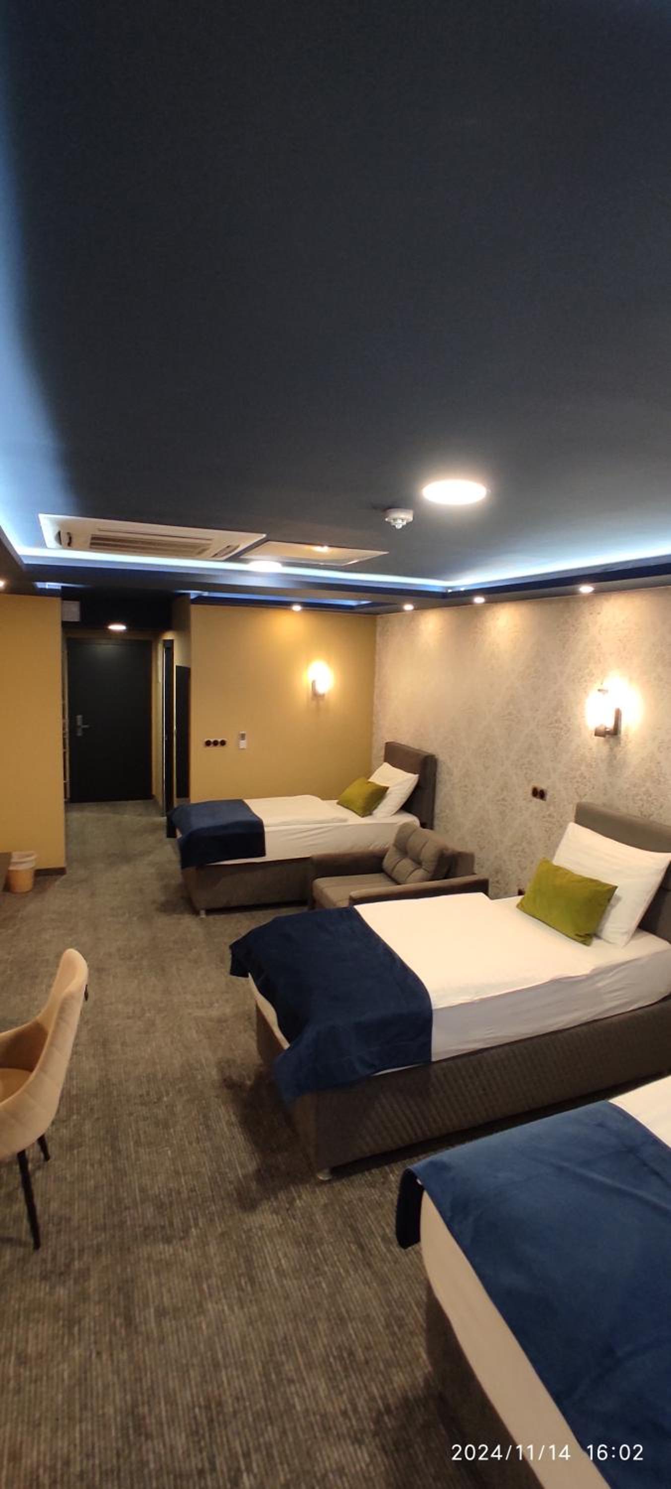 Deluxe Triple Room - Photo 9