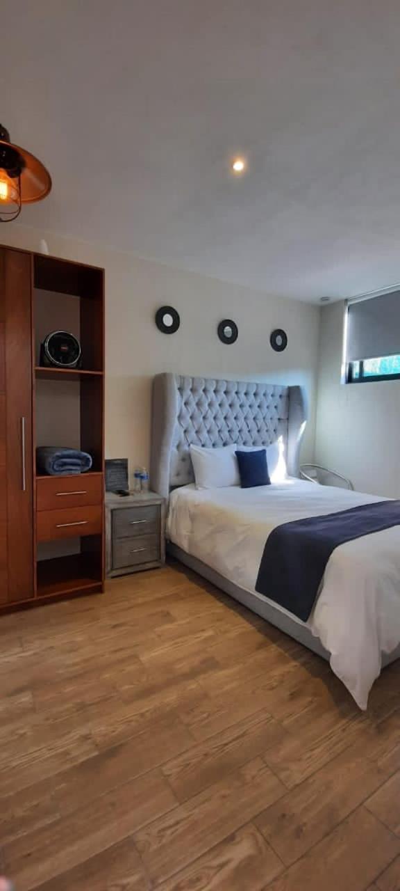 Deluxe Queen Room - Photo 16