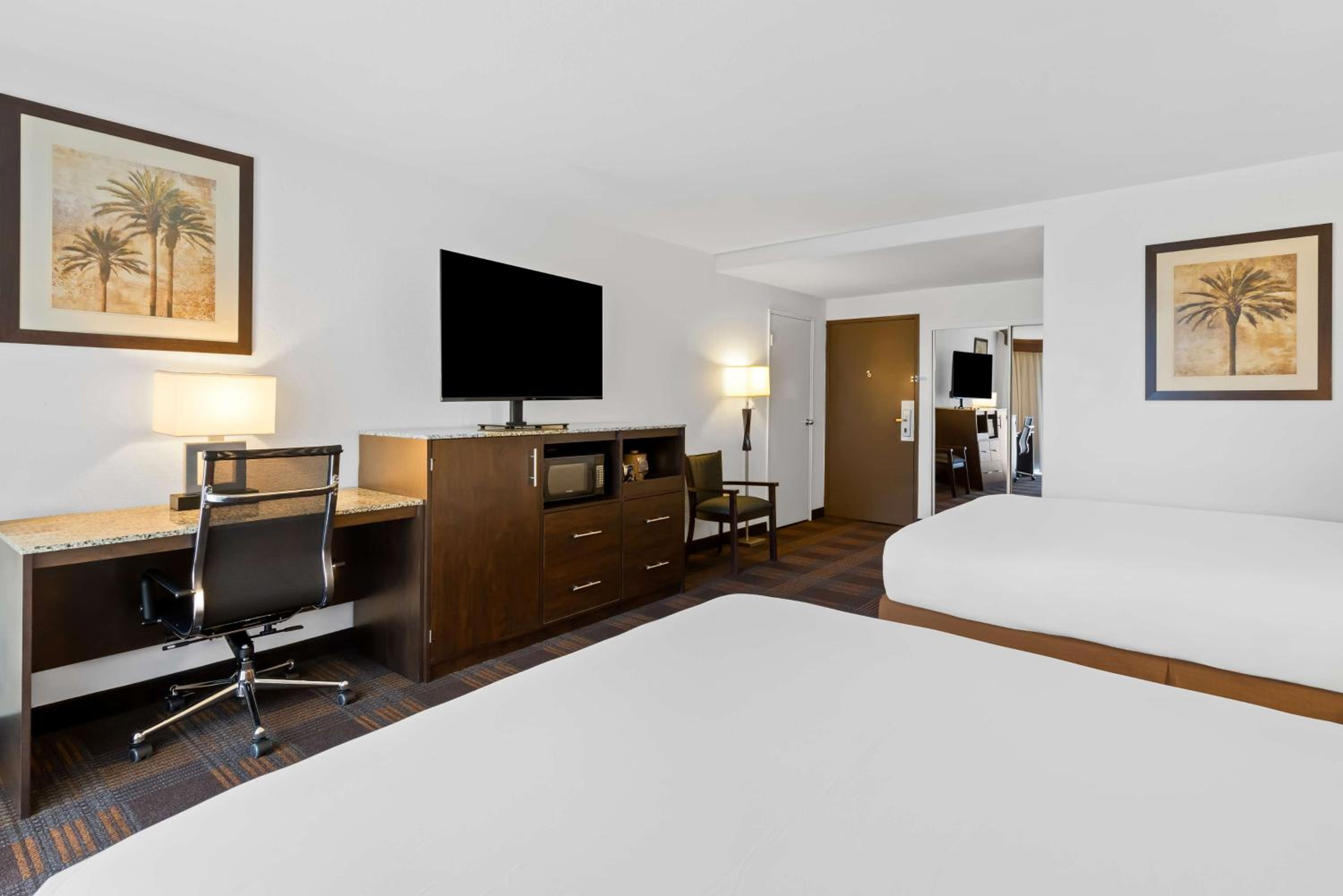 Deluxe Queen Room with Two Queen Beds - Photo 1