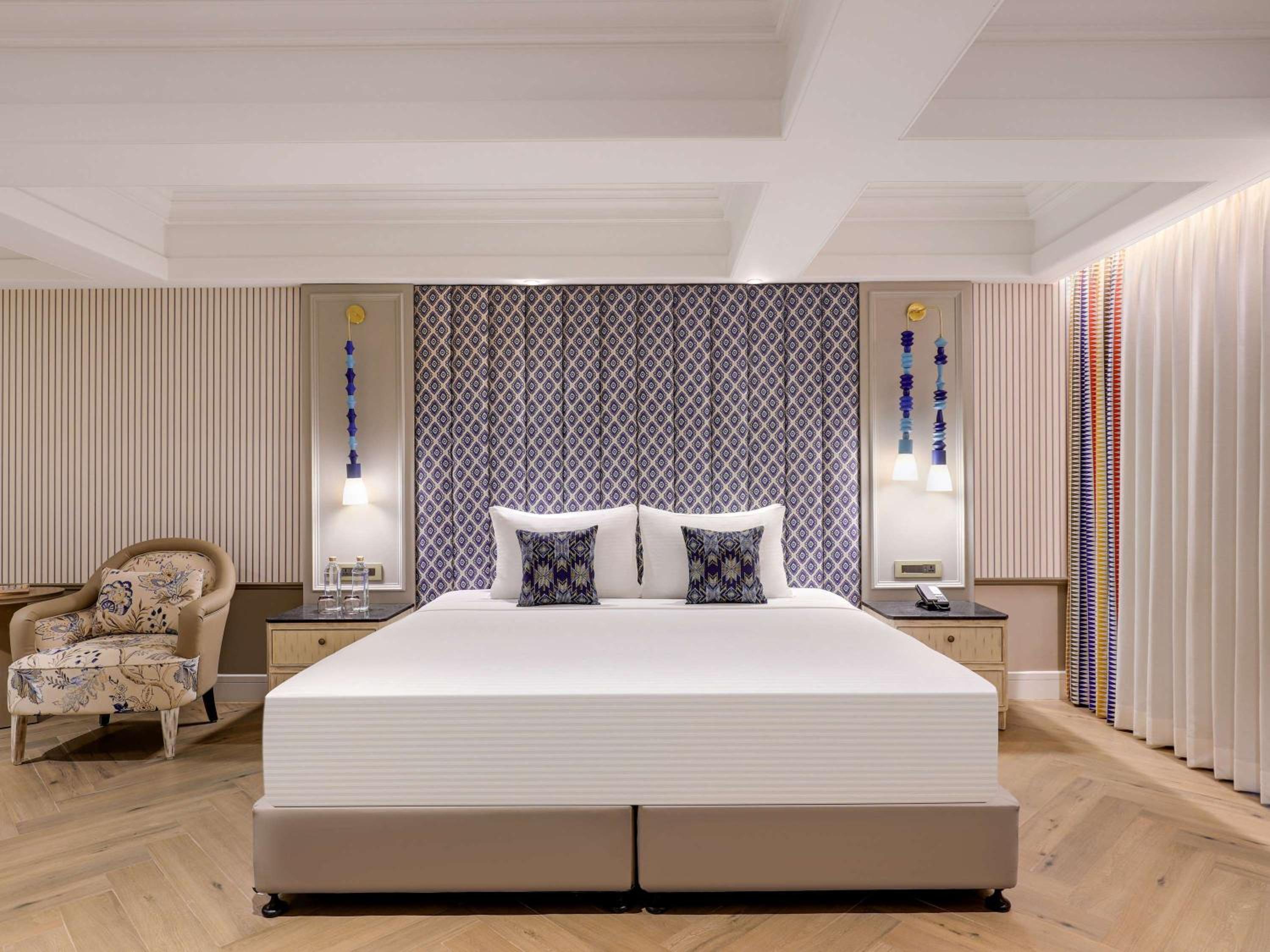 Premium King Room with Bath Tub and Balcony - - Beer Bucket 4 on arrival, INR 1000 SPA Credit, 15% Discount on Food & Beverages