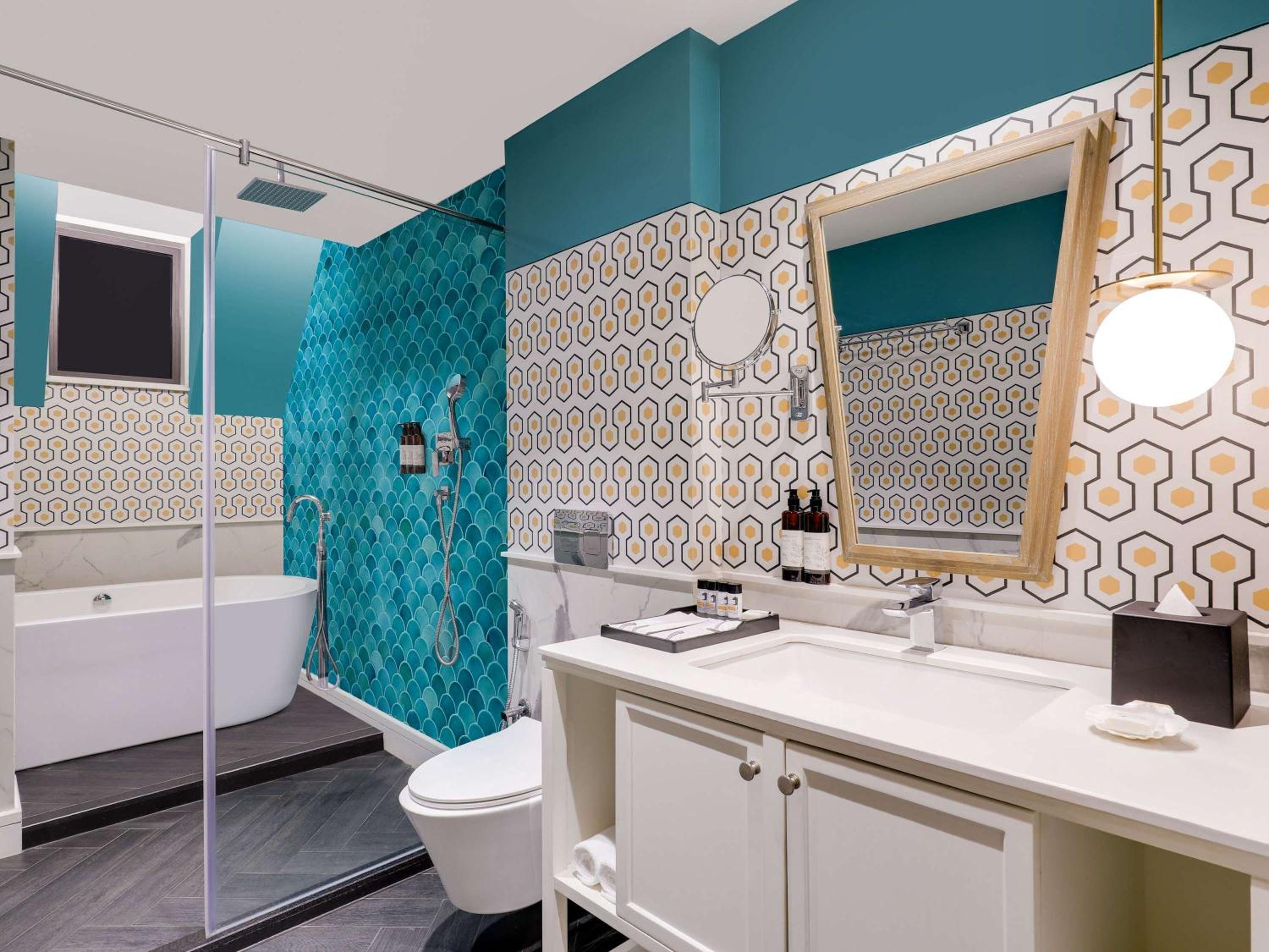 Premium King Room with Bath Tub and Balcony - - Beer Bucket 4 on arrival, INR 1000 SPA Credit, 15% Discount on Food & Beverages