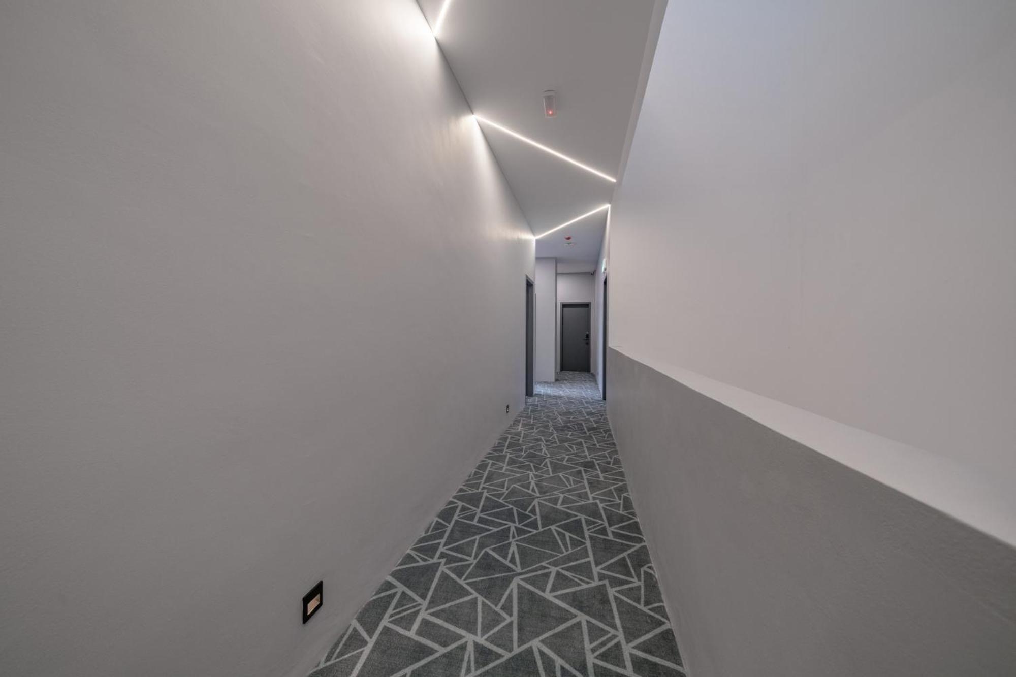 Deluxe Family Suite - Photo 19