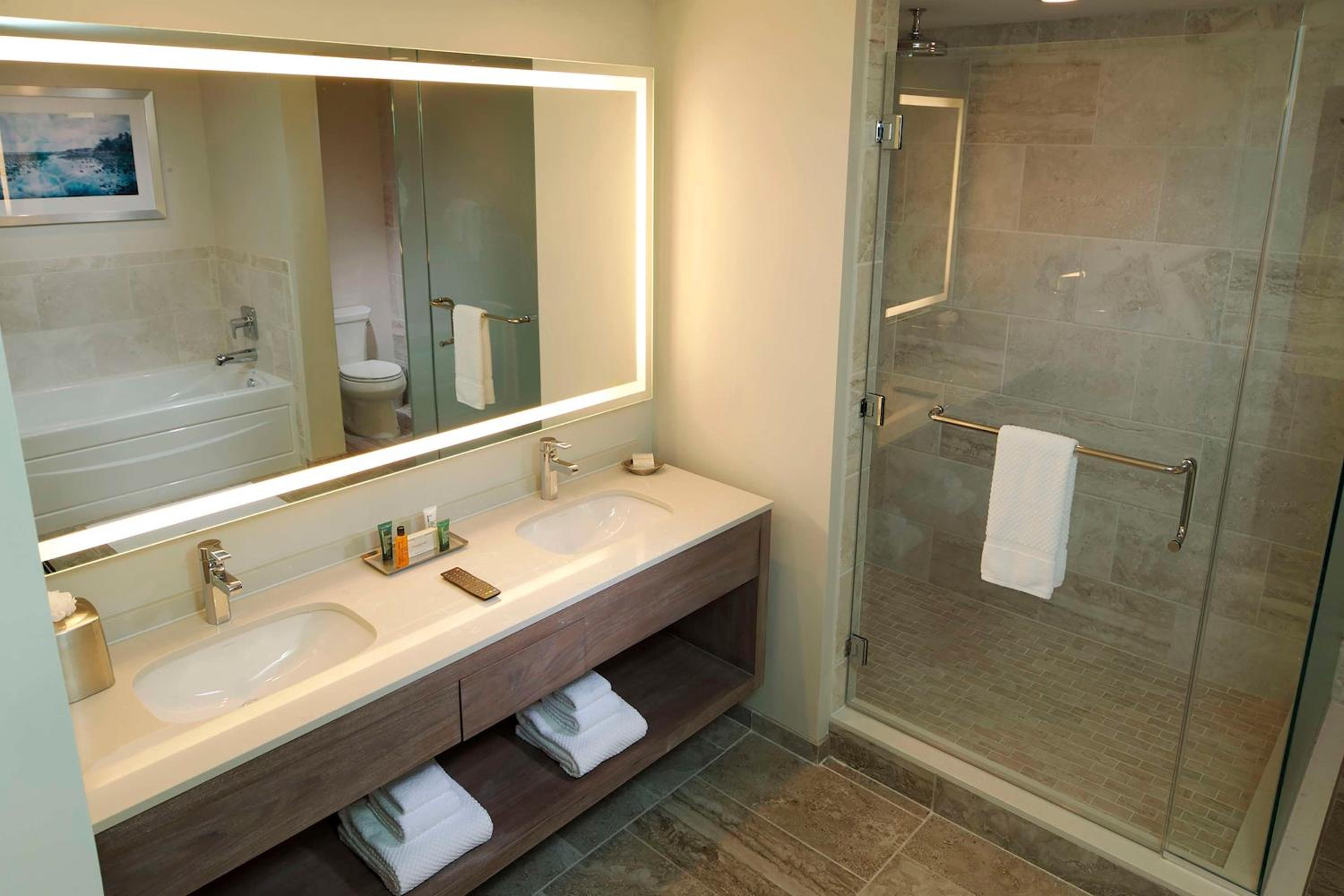 Two-Bedroom Suite with One King Bed, Two Double Beds and Roll-in Shower - Accessible