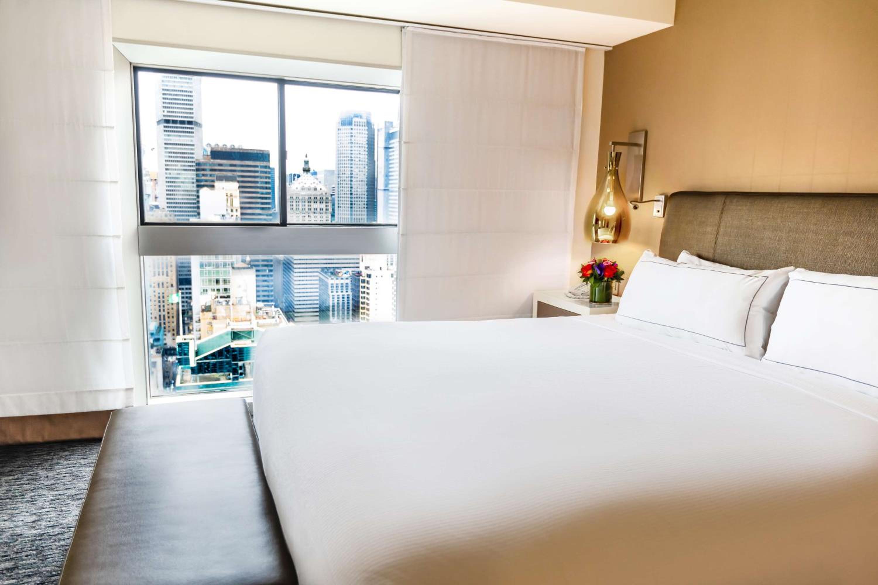 Deluxe Two-Bedroom King Suite with Queen Bed and Skyline View photo 1