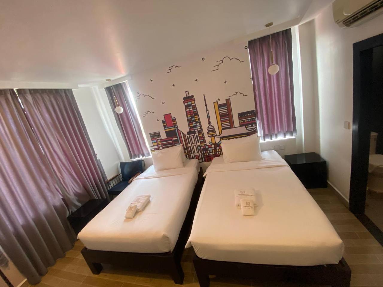 Superior Queen Room with Two Queen Beds - Photo 2
