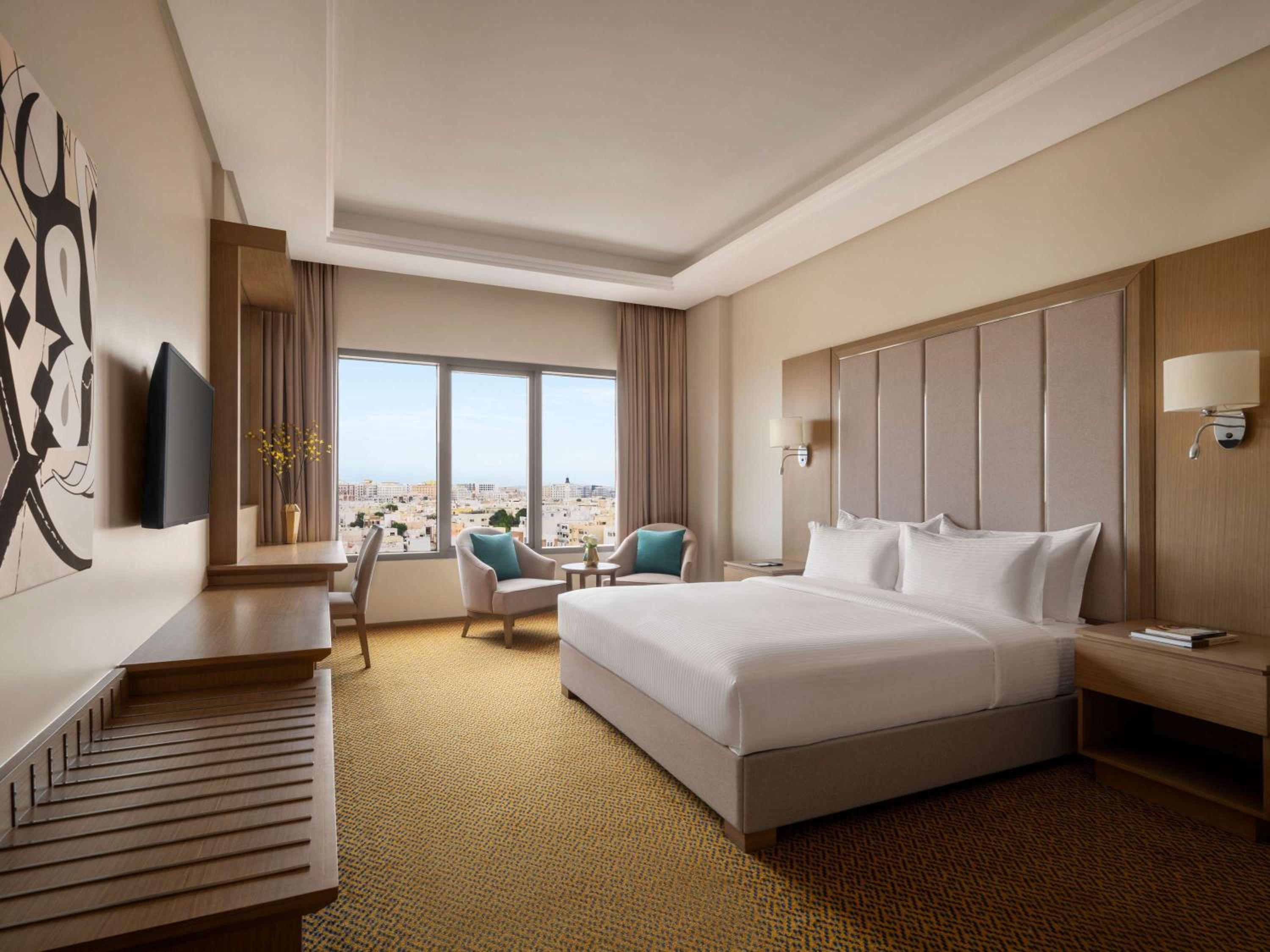 Deluxe King Room with Sea and City View