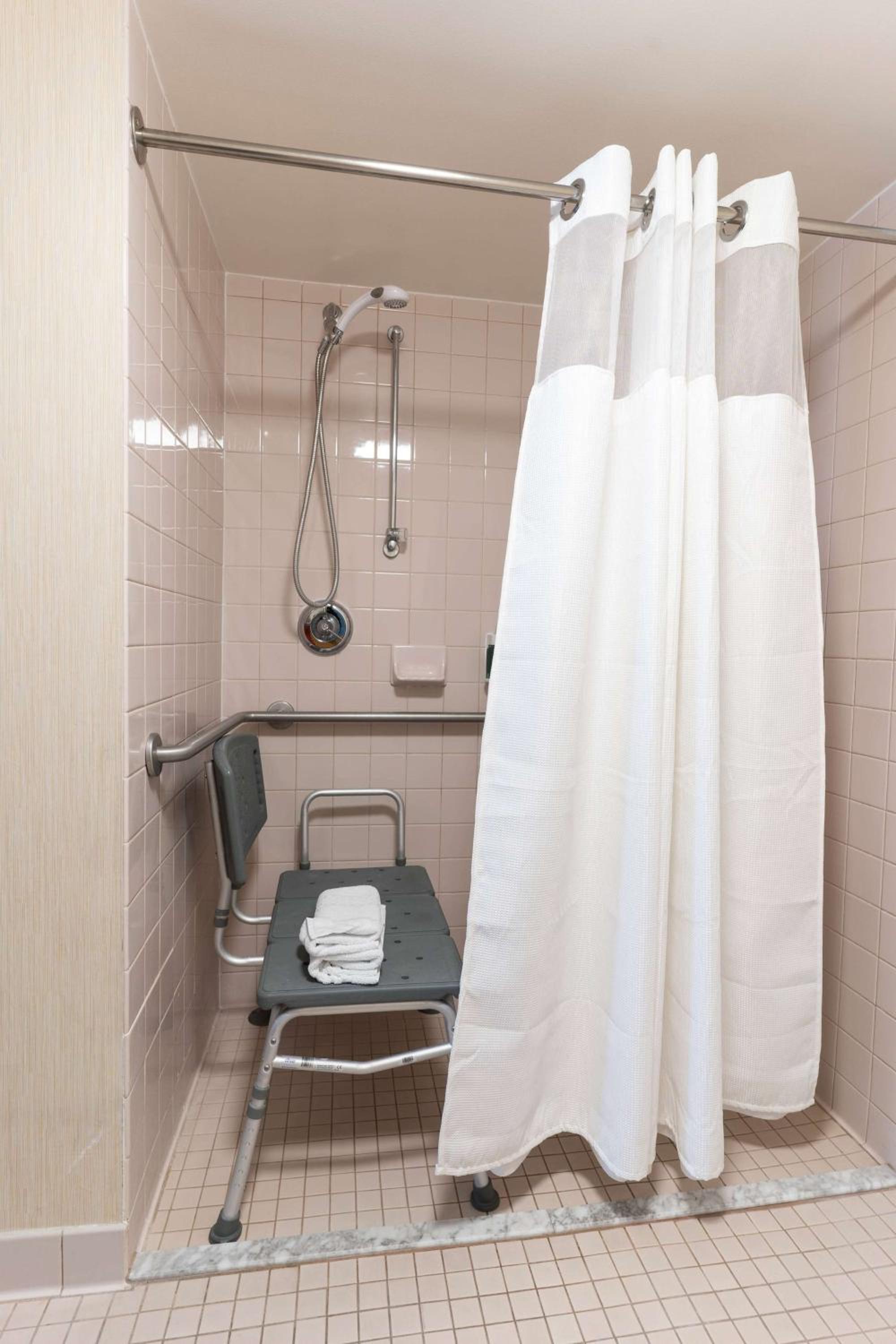 Mobility Accessible Studio Suite Queen Roll-In Shower