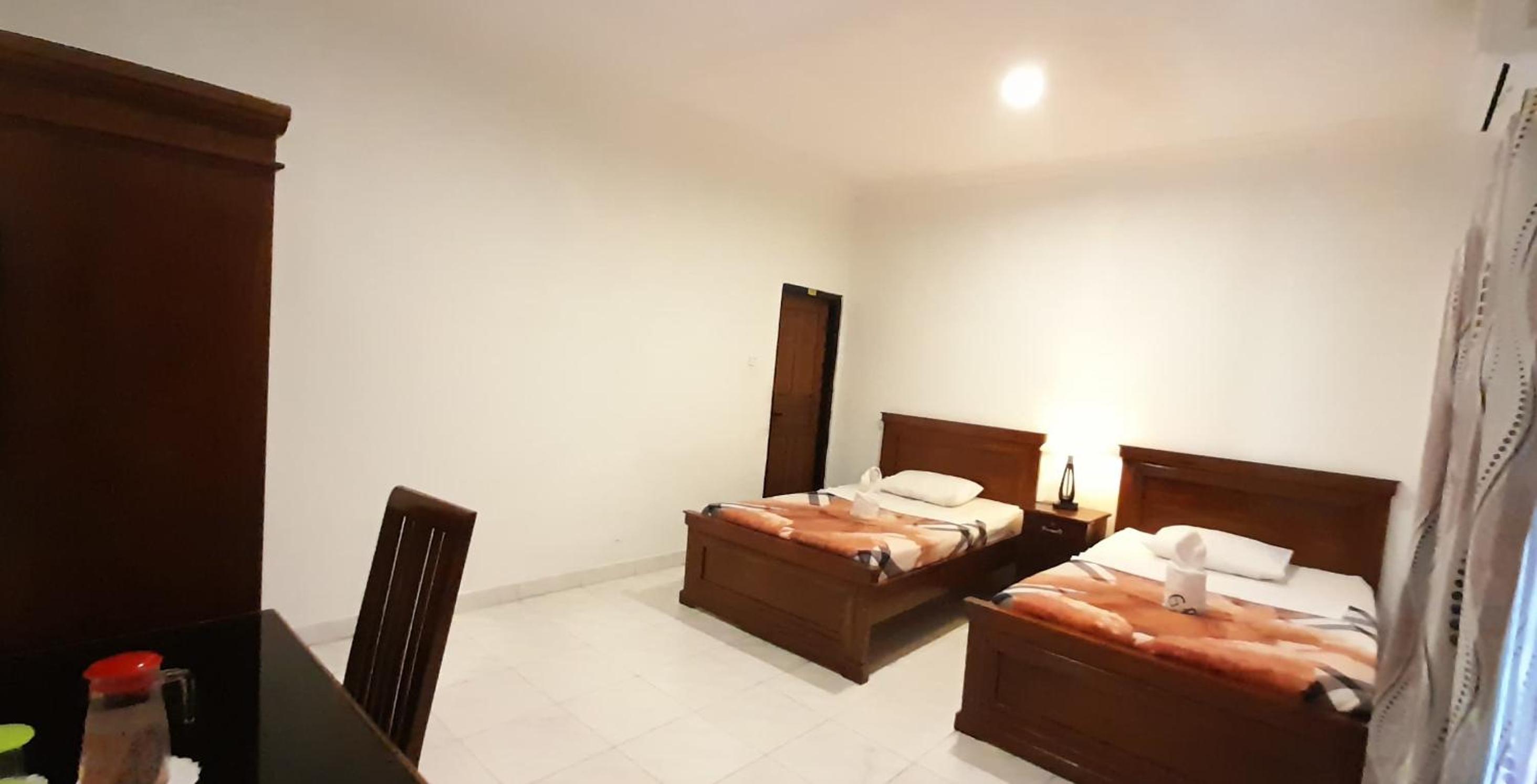 Standard Twin Room - Photo 8