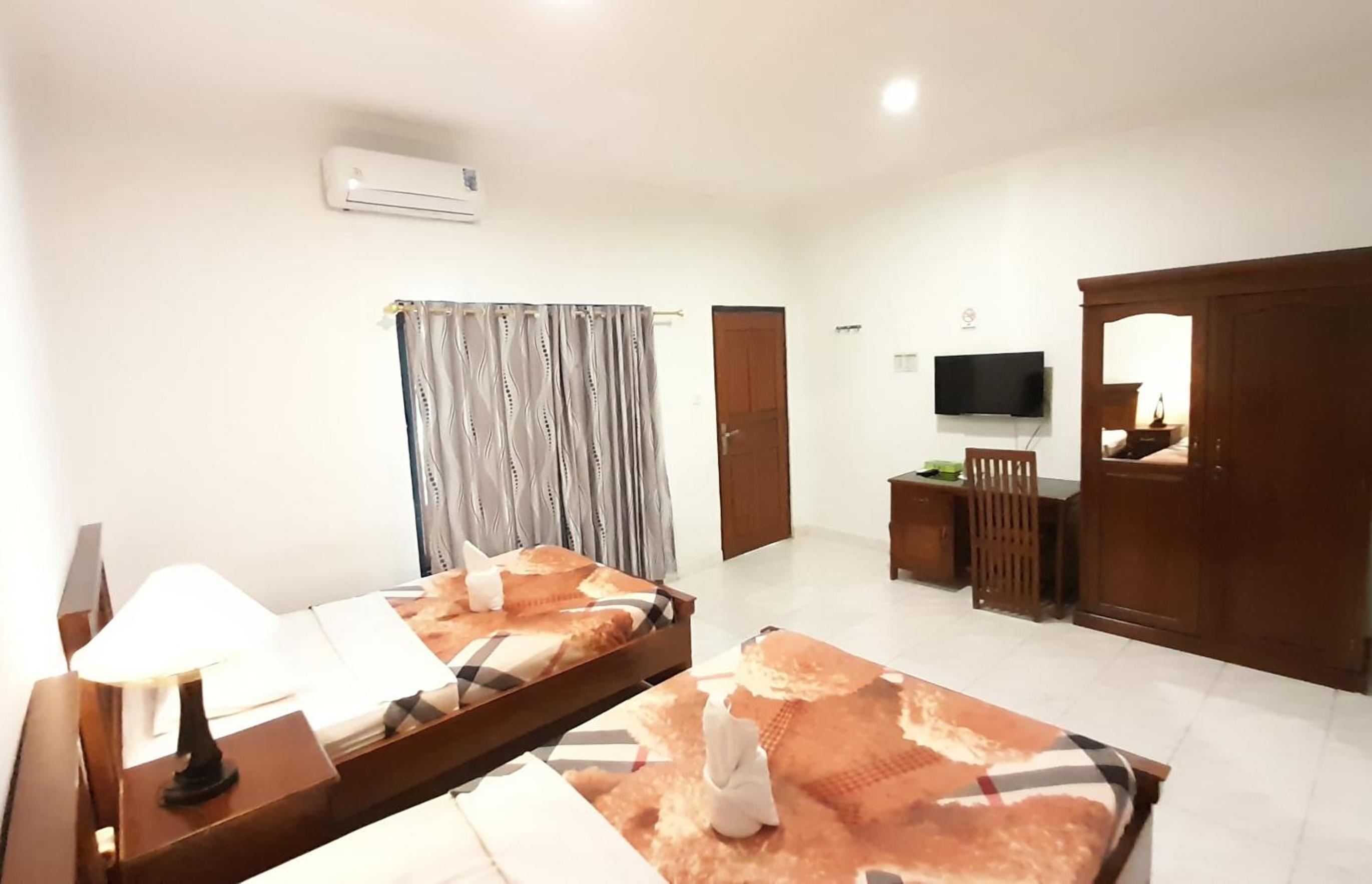 Standard Twin Room - Photo 7