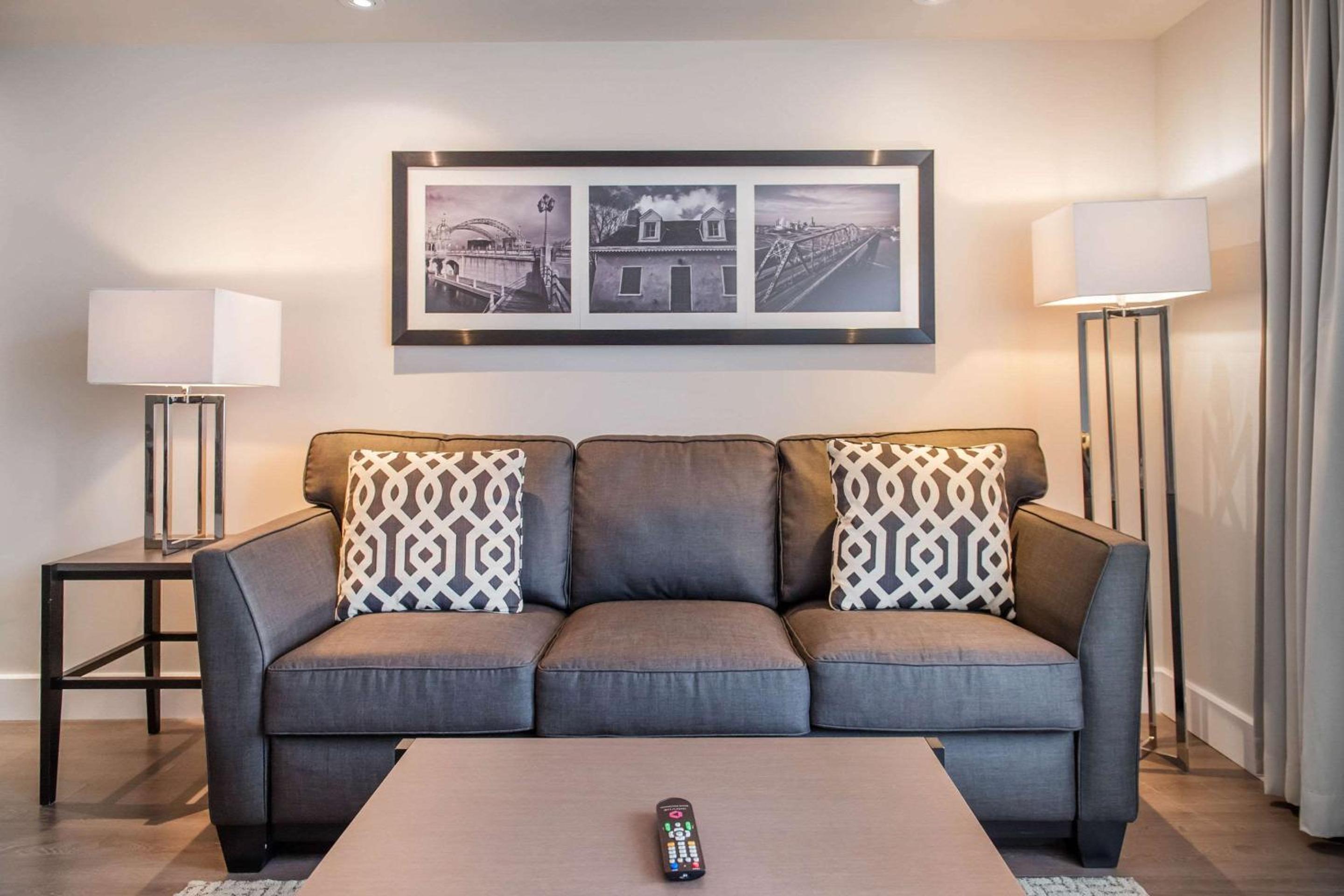 Queen Suite with Two Queen Beds and Sofa Bed - Photo 1