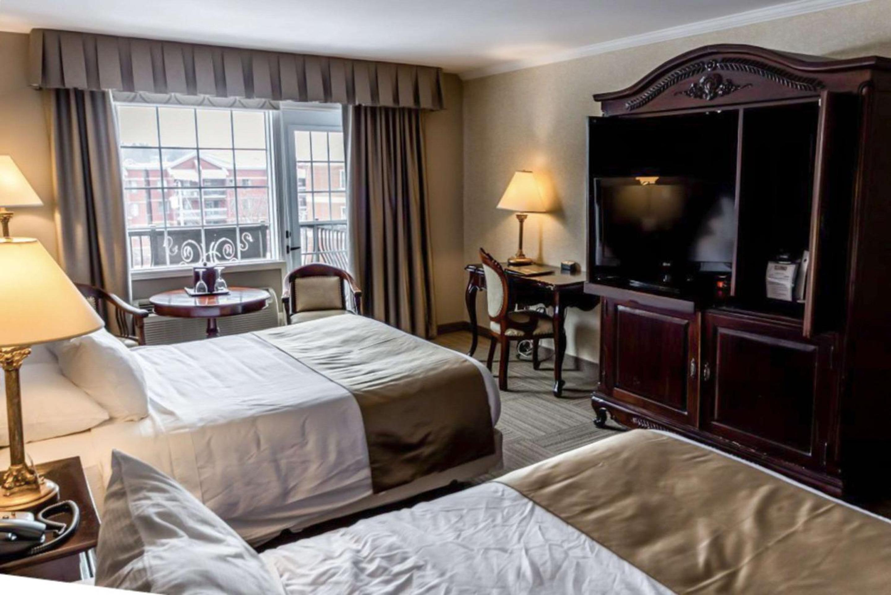 Superior Two Queen Beds with Partial Lake View - Photo 2