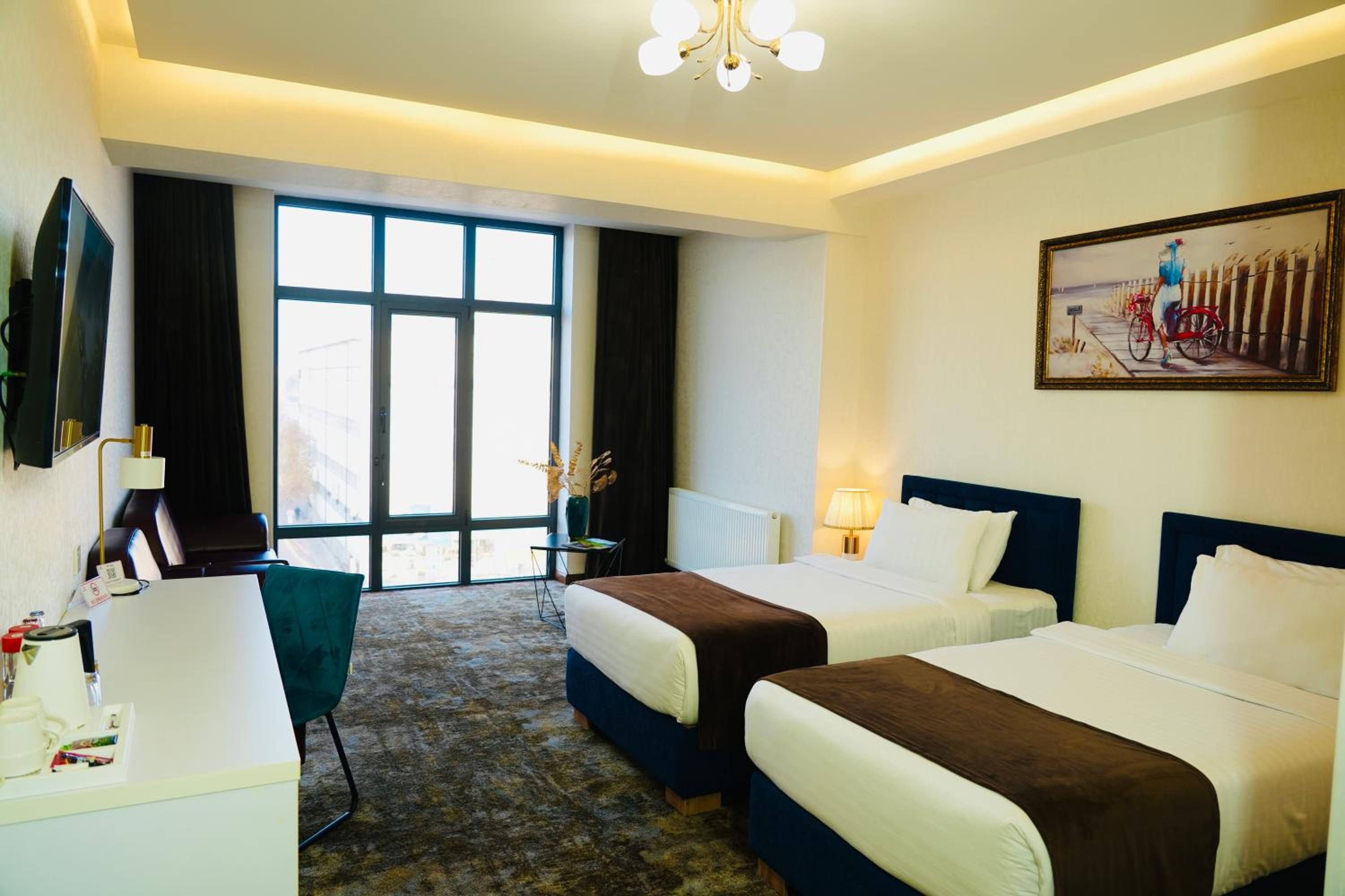 Deluxe Twin Room - Photo 17