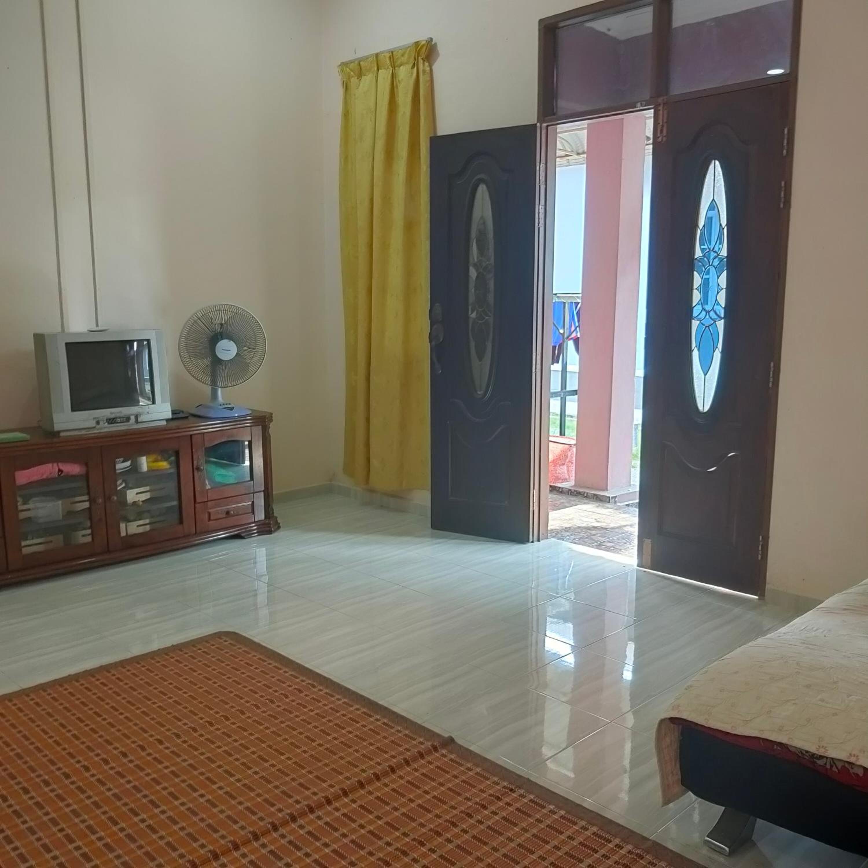 Three-Bedroom House photo 1