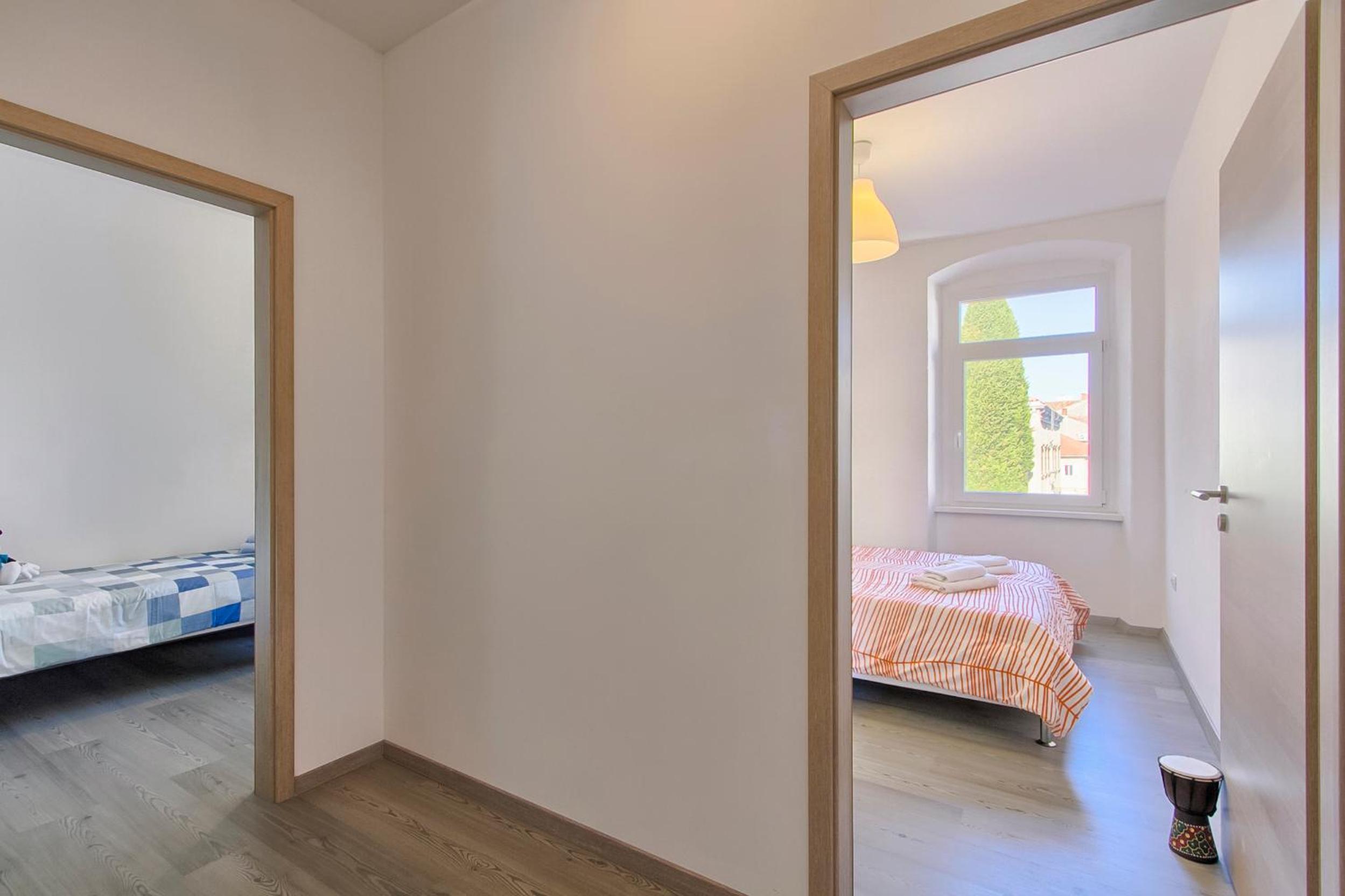 Three-Bedroom Apartment - Photo 11