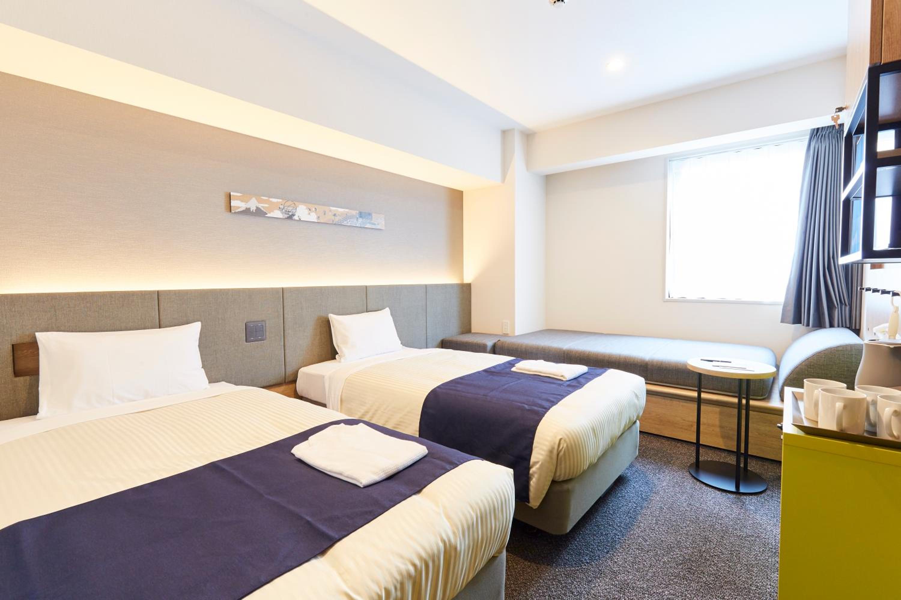 Corner Twin Room with Sofa Bed