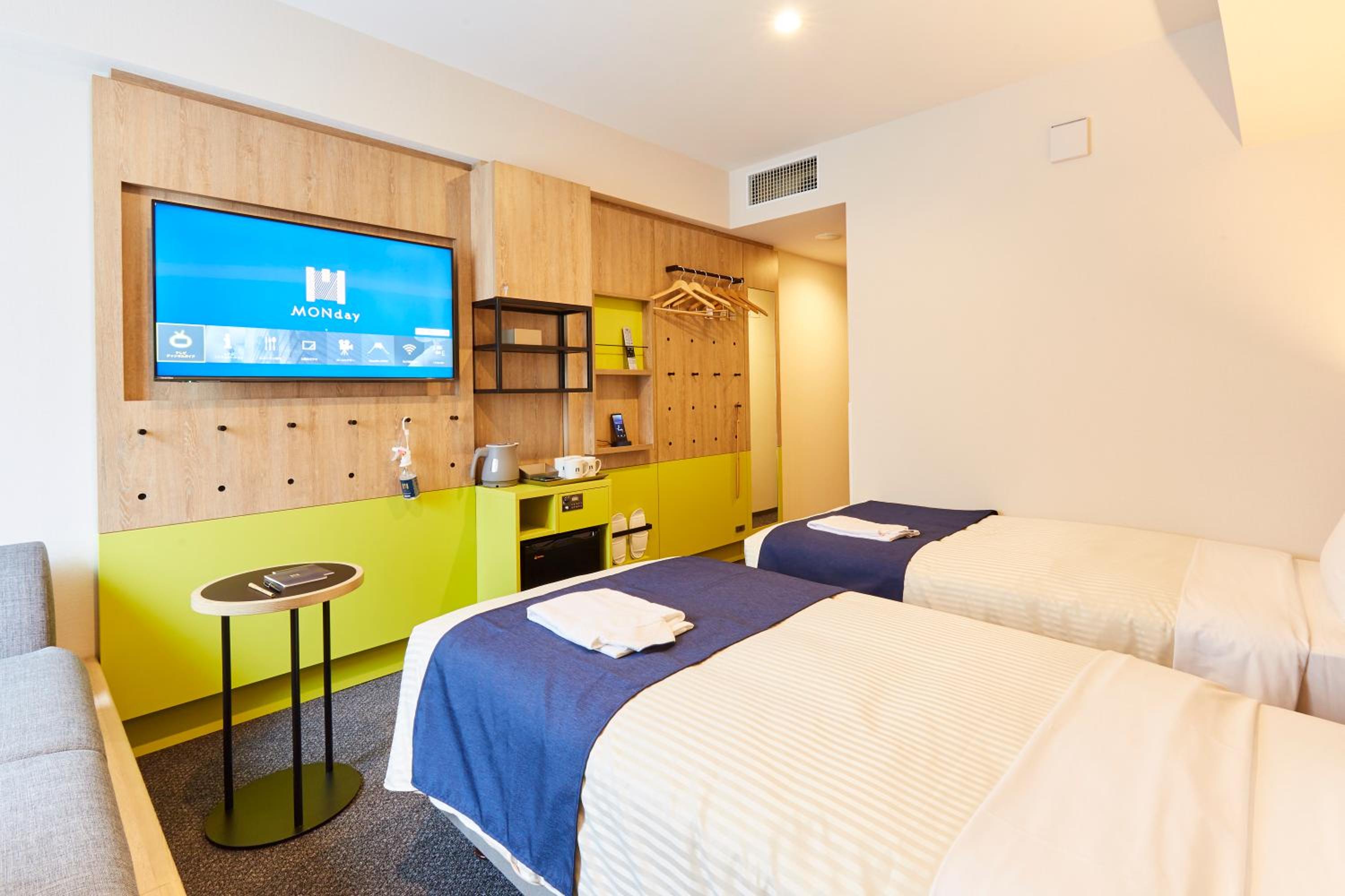 Corner Twin Room with Sofa Bed  photo 3